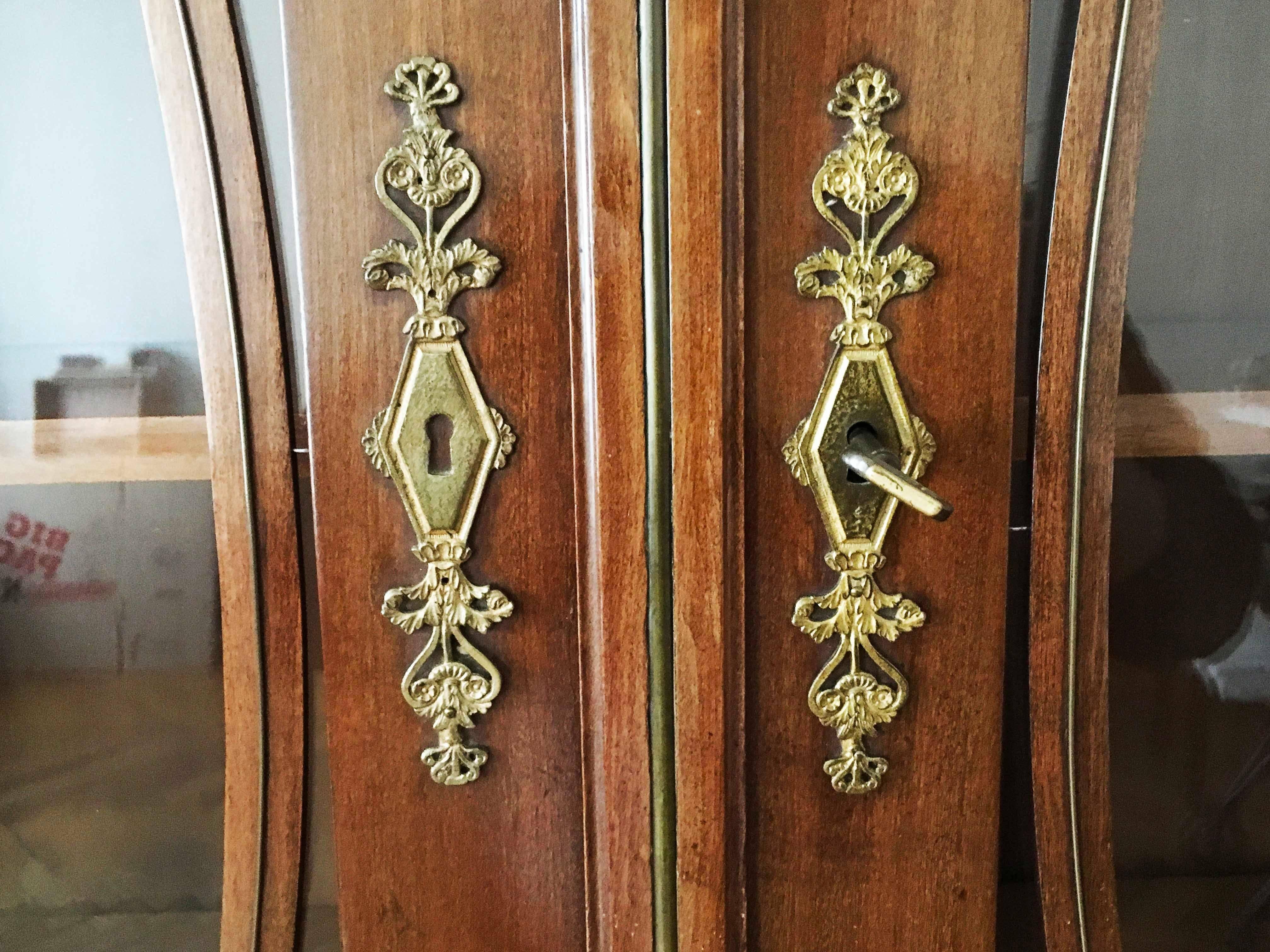 The bookcase is made of mahogany and decorative elements remind one of the English designer Thomas Sheraton, due to the straight, clean lines it was made in the 1920s.
Dimensions: 51.18in, 130cm wide
19.68in, 50cm deep
86.61in, 220cm height.