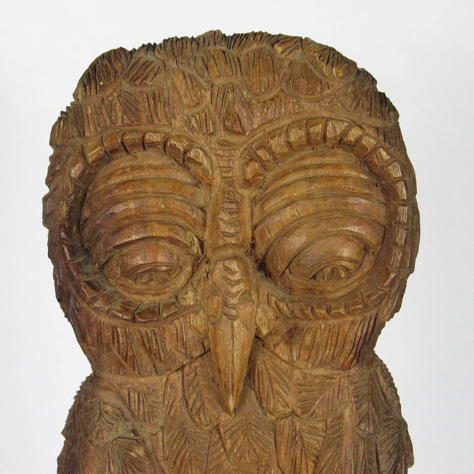 This playful Folk Art carved owl is standing at the ready to enhance your decor and delight your guests. Chip carved from a single piece of wood and initialed on the base R.JP+H, the figure likely dates to the end of the 19th or early 20th century.
