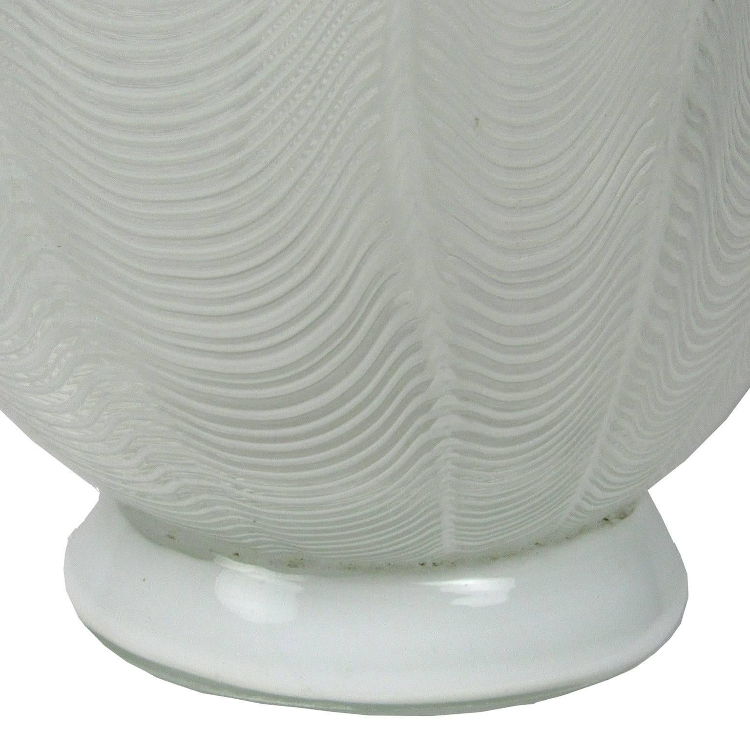 Murano white filigree handblown glass vase, unsigned. Height: 16 1/2 in., width: 9 in., depth: 5 in.