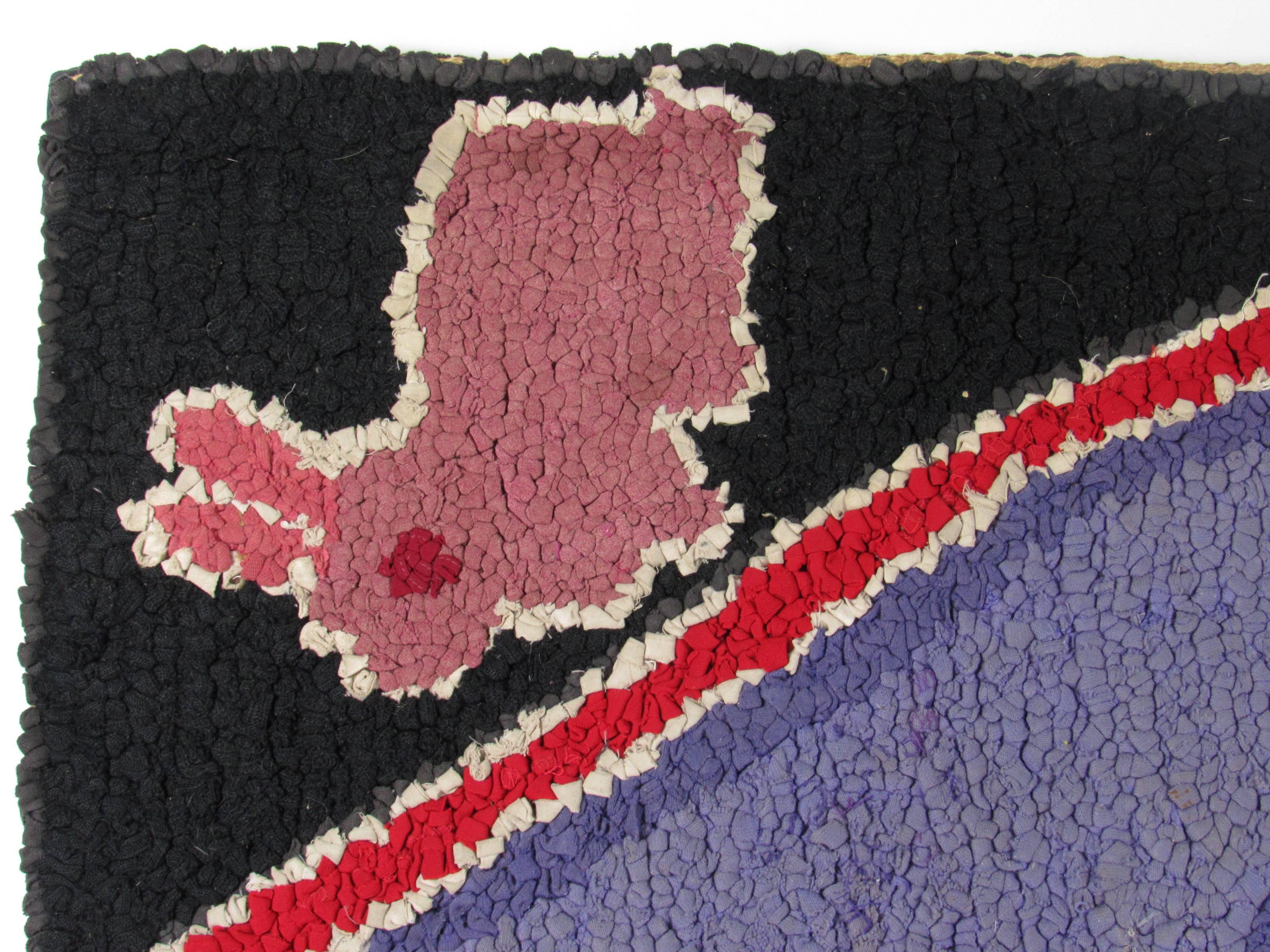 American Folk Art Rabbit in Diamond Hooked Rug, late 19th century.  A brown rabbit against a blue/purple ground sits in the center diamond form medallion surrounded by four pink rabbits on black ground.  Mounted on black fabric and new stretchers. 