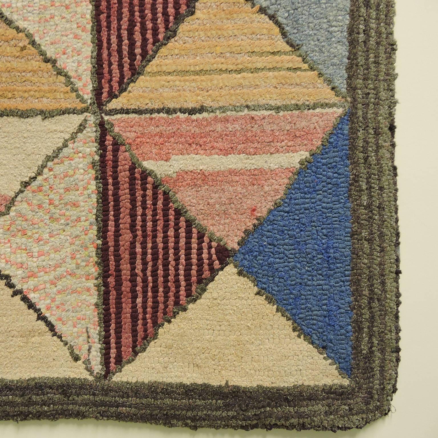 Exceptionally drawn and colorful vintage geometric hook rug, 20th century. Excellent condition.
Dimensions: 52 x 33 inches.