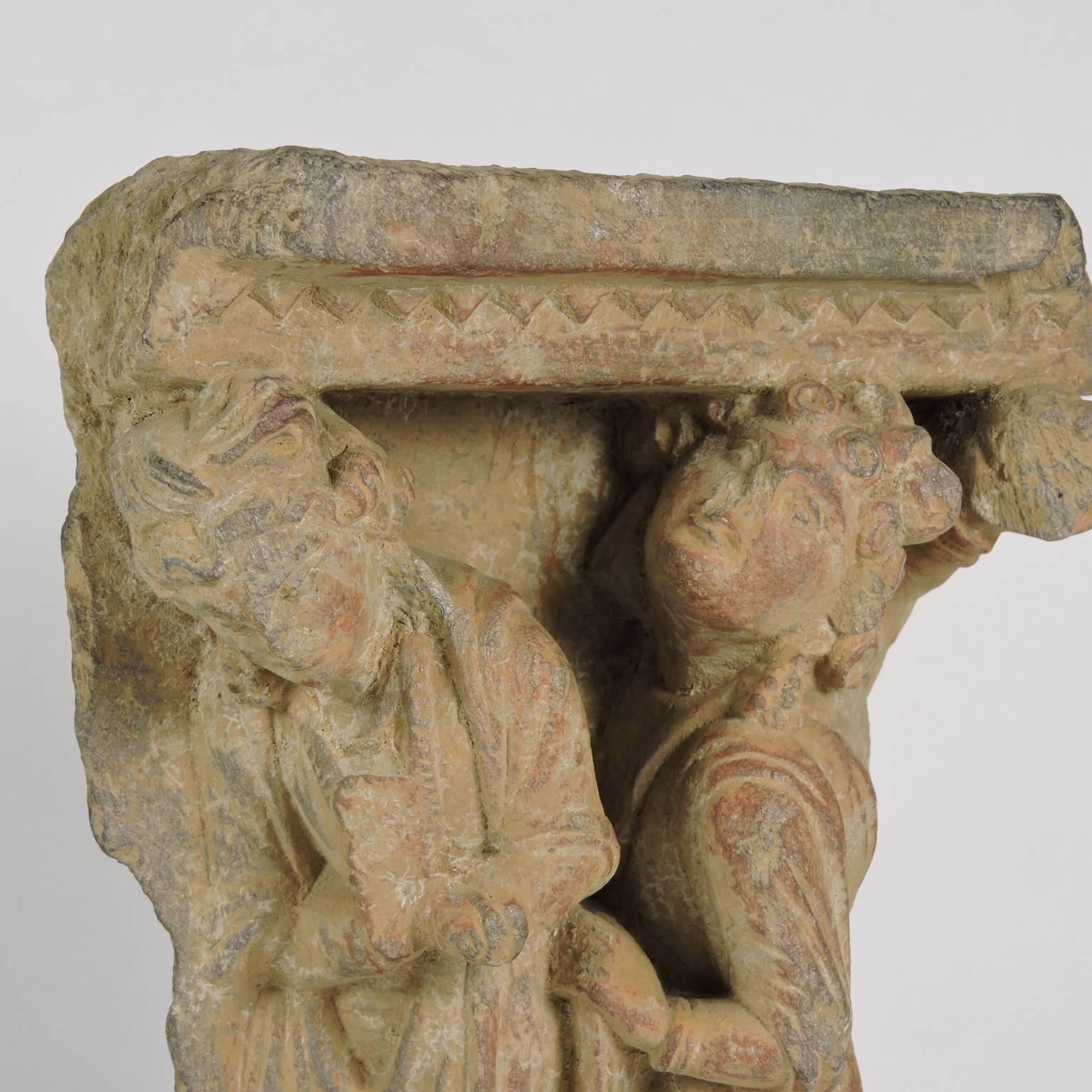 Gandharan carved stone architectural bracket, approx.200 AD; depicting two figures in robes, mounted on a wood base. Provenance of the Estate of T Bryant, former US State Department 1960s.
Dimensions: 7 3/4 x 7 x 2 1/2 in. Overall height with base: