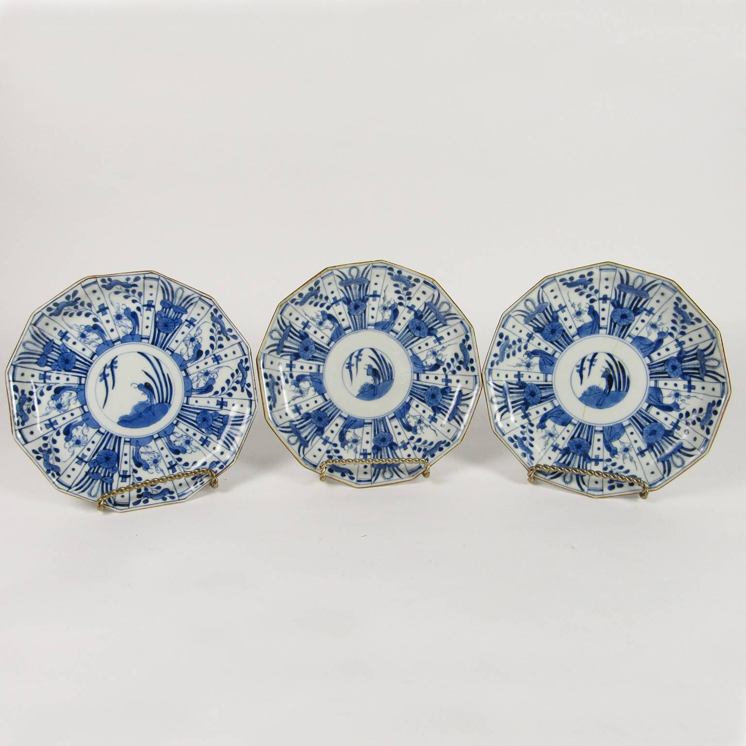 Set of six rare Japanese Ko-Imari blue and white porcelain plates, late 19th century, in the shape of a dodecagon (12 sides), with mark on bottom in underglaze blue. Diameter: 7 1/4 inches.