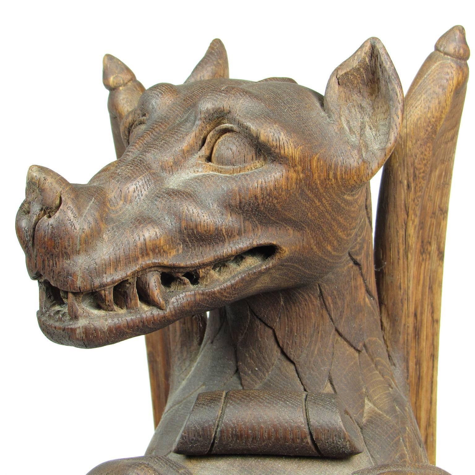 Oak Rare 19th Century Carved Wood Figure of a Dragon Holding a Shield For Sale