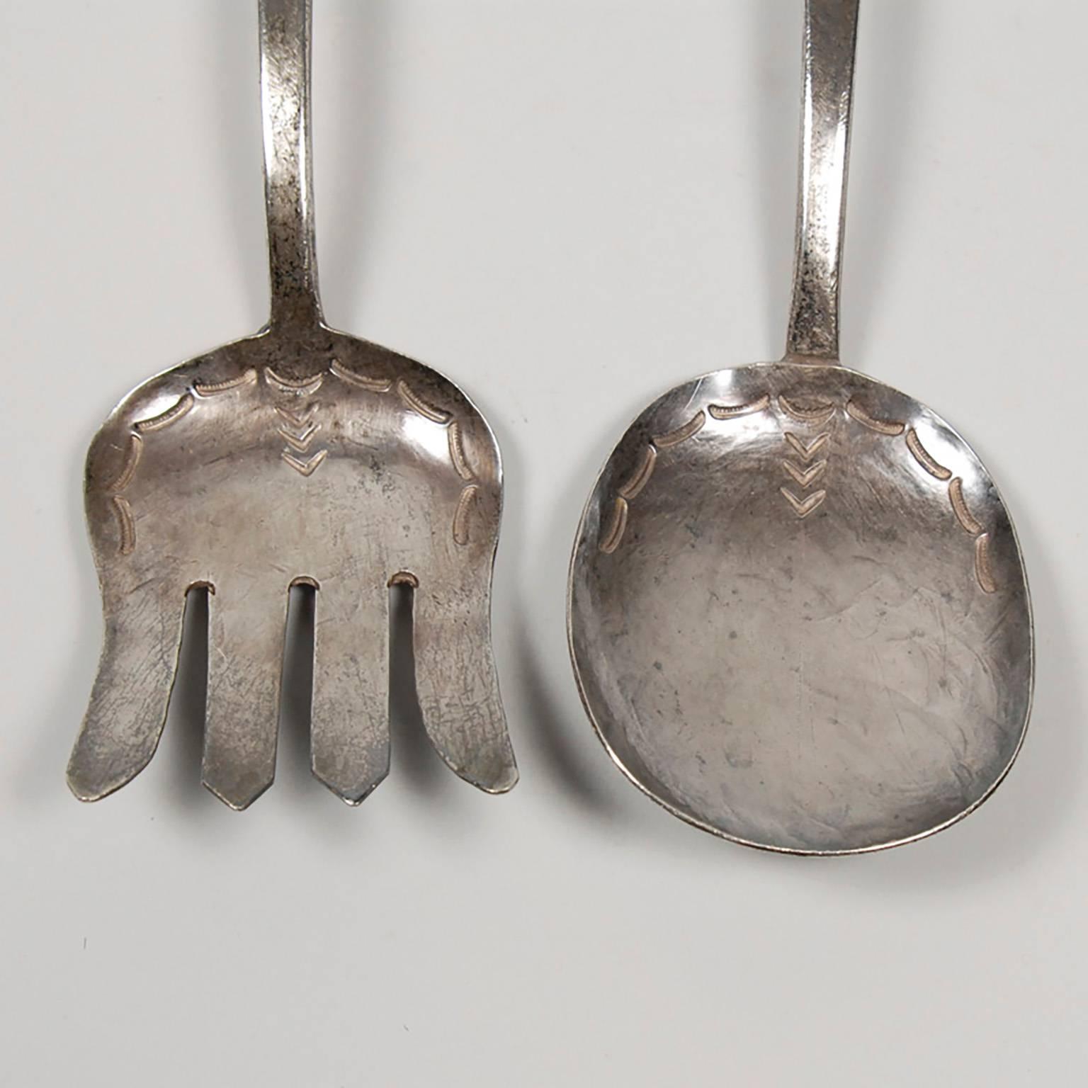 Set of Native American Navajo silver servers, early 20th century.
Length: 9.5 inches.
