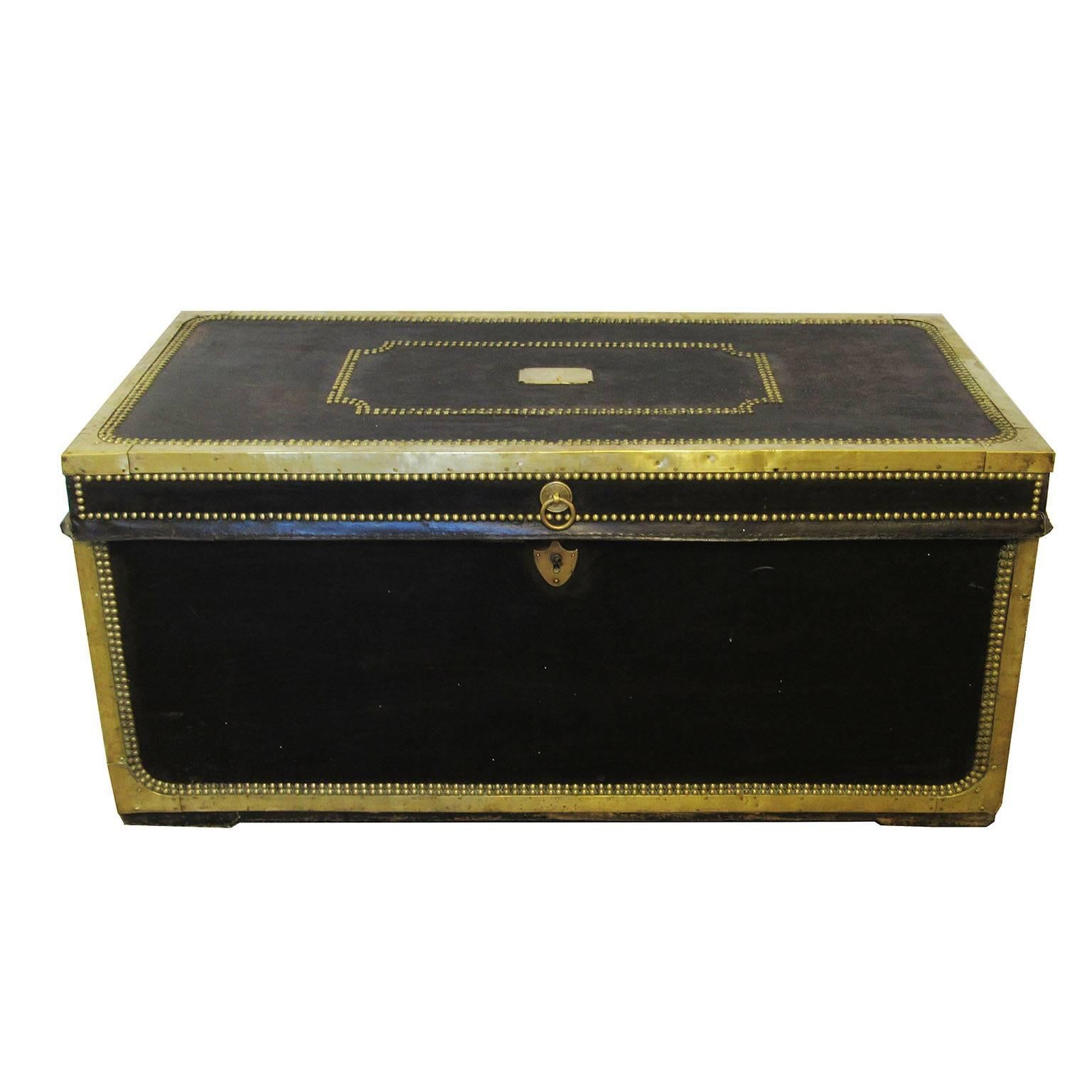 19th century China trade leather and brass banded camphor wood trunk, with studded decoration, two carrying handles and a brass plaque engraved 