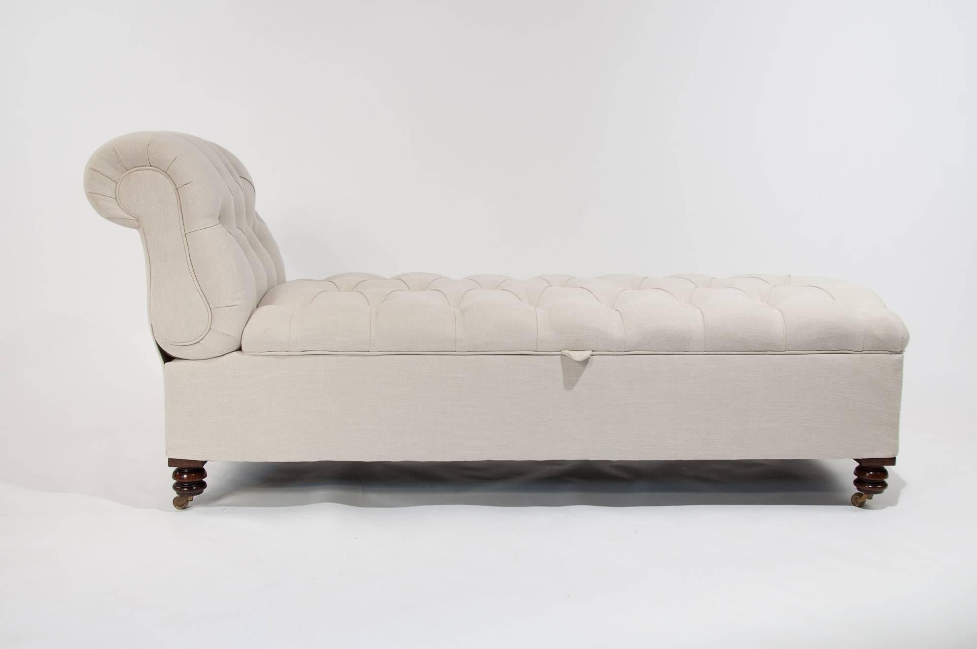 A good quality Victorian adjustable daybed / couch / ottoman upholstered in a neutral colored linen fabric. 
This stylish daybed has an adjustable ratcheted deep buttoned headrest allowing it to fully recline with a deep buttoned top which lifts to