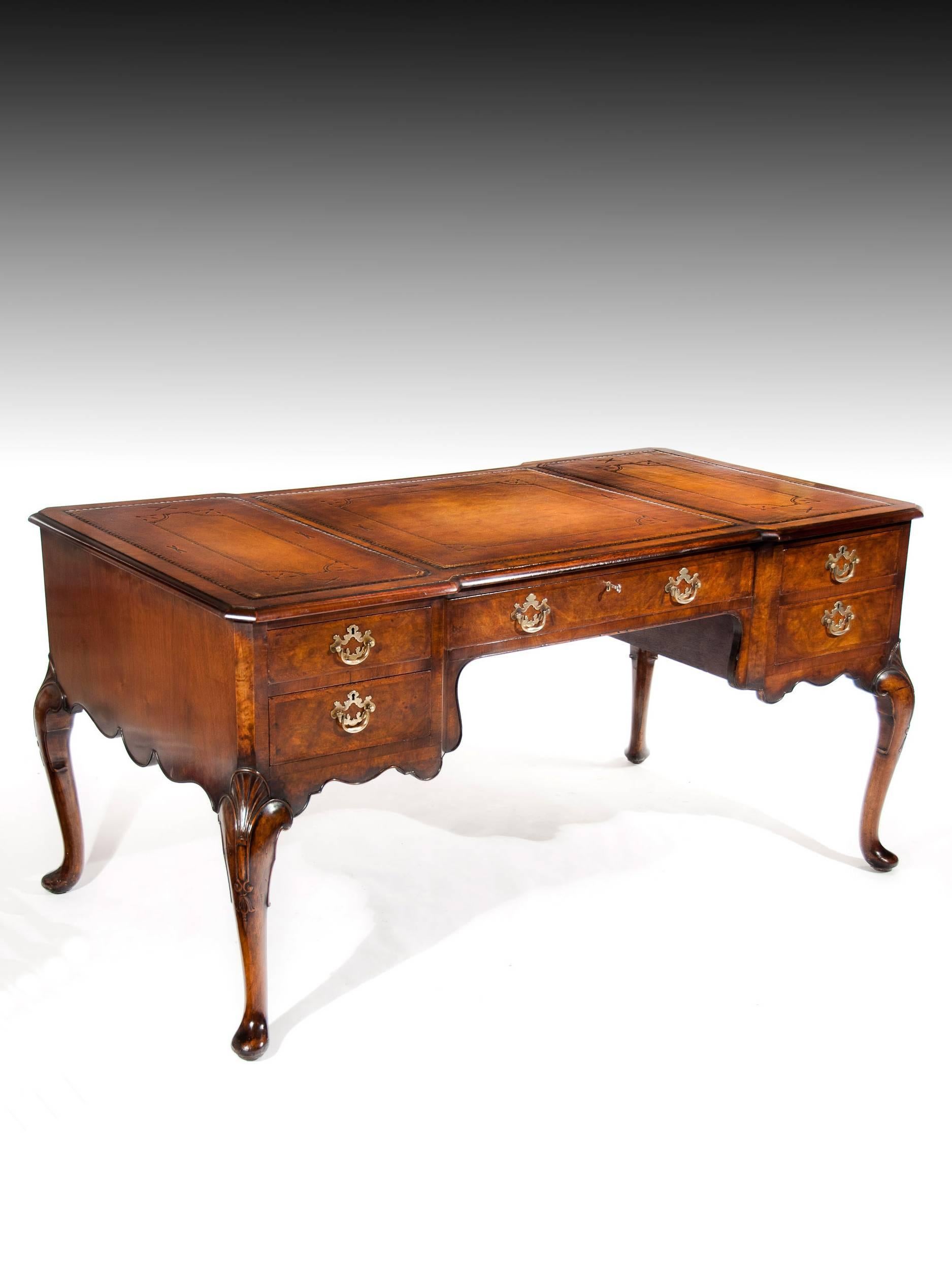 A very attractive burr walnut breakfront partners writing desk of good colour dating to circa 1900-1920s.
This antique desk has been constructed to the highest standard having choice cuts of burr walnut veneer good oak sided draw linings. This