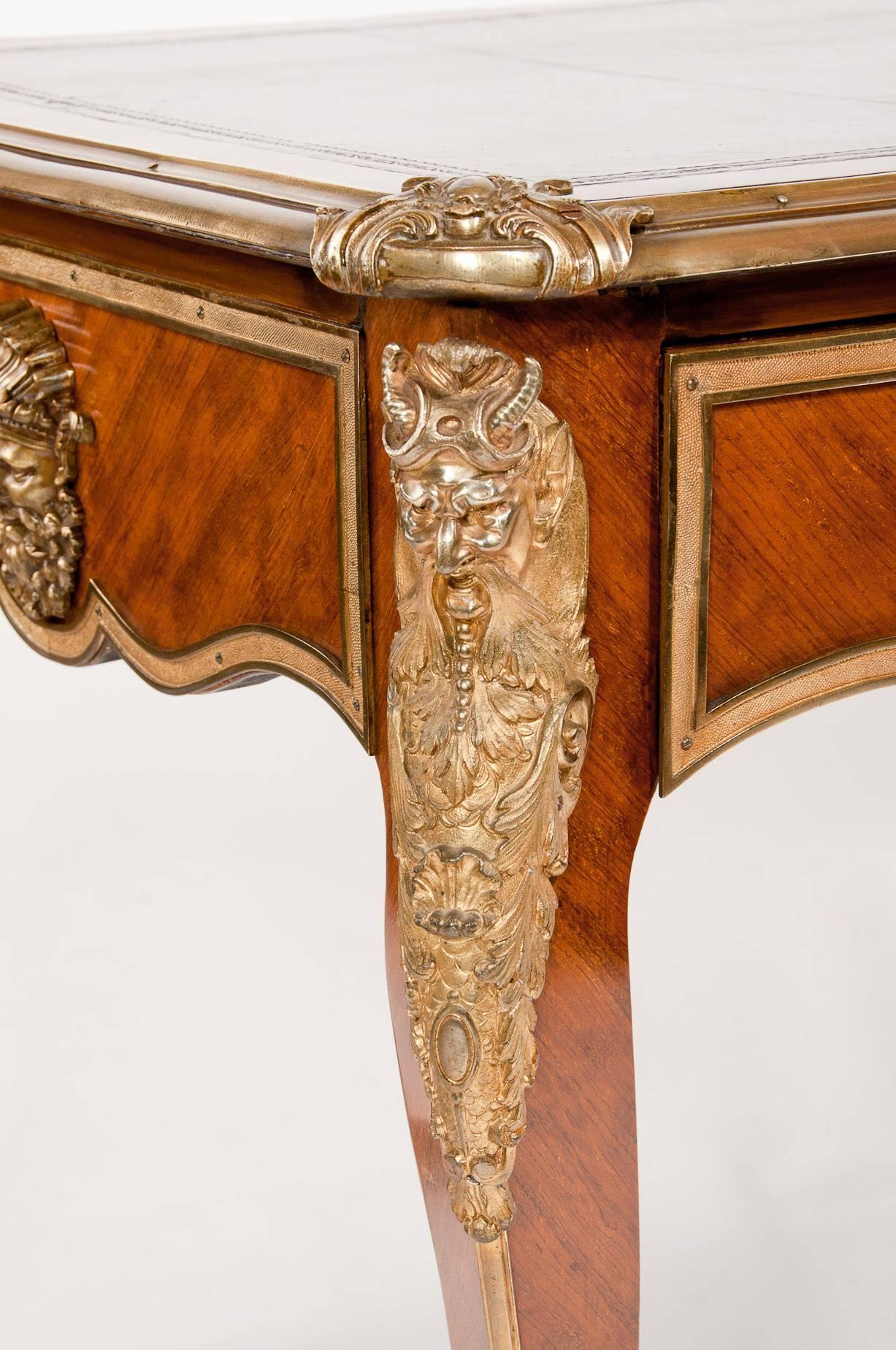 An exquisite 19th century French kingwood bureau plat with ormolu mounts and three drawers this exceptional quality bureau plat has been constructed in kingwood veneers and ormolu mounts to the finest standards and dating to circa 1870 retains it