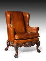 Handsome Late Victorian Leather Carved Wing Chair