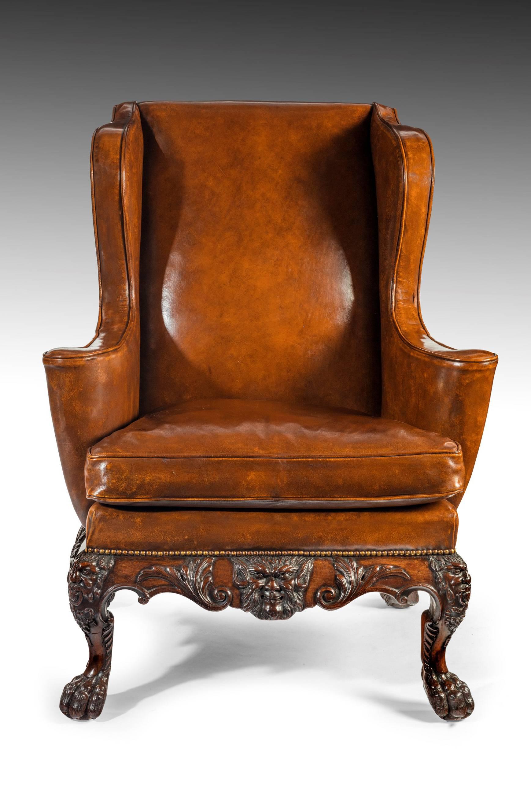 English Handsome Late Victorian Leather Carved Wing Chair
