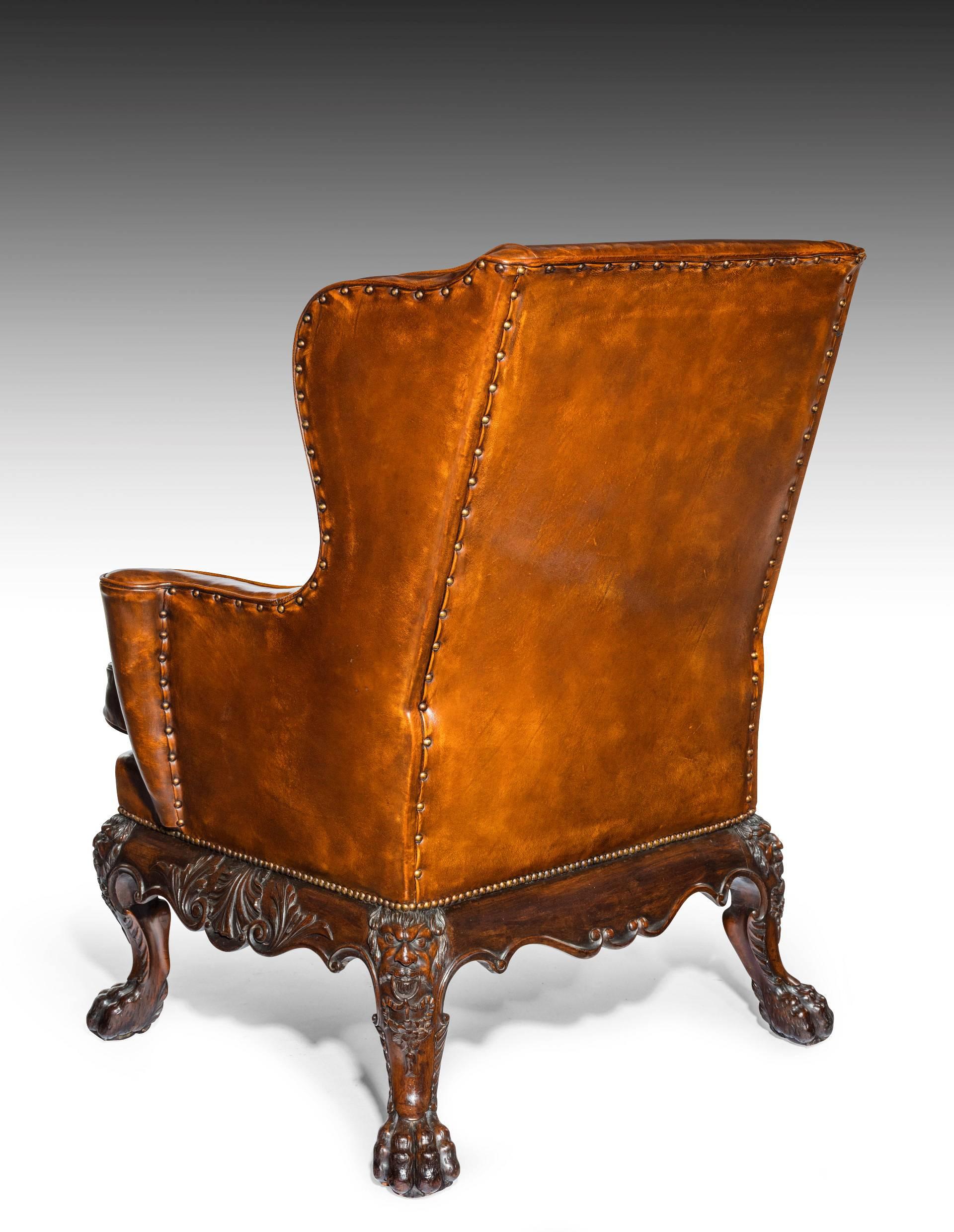 19th Century Handsome Late Victorian Leather Carved Wing Chair