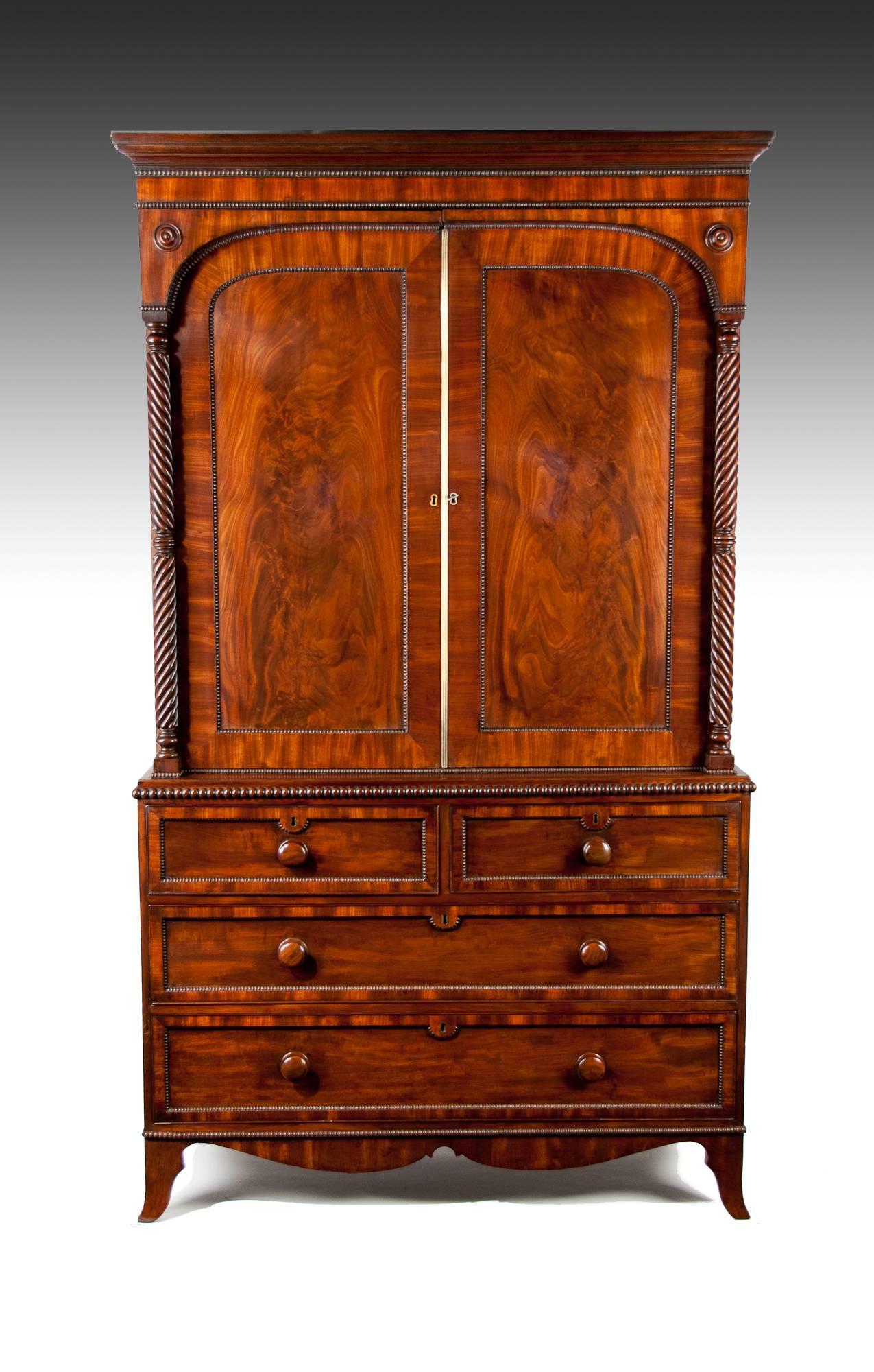 A superb William IV mahogany Linen Press with a wonderful colour and patina, circa 1830.
This antique linen press has been constructed with choice veneers of mahogany which have mellowed over the years to a stunning colour and patina. 
The moulded