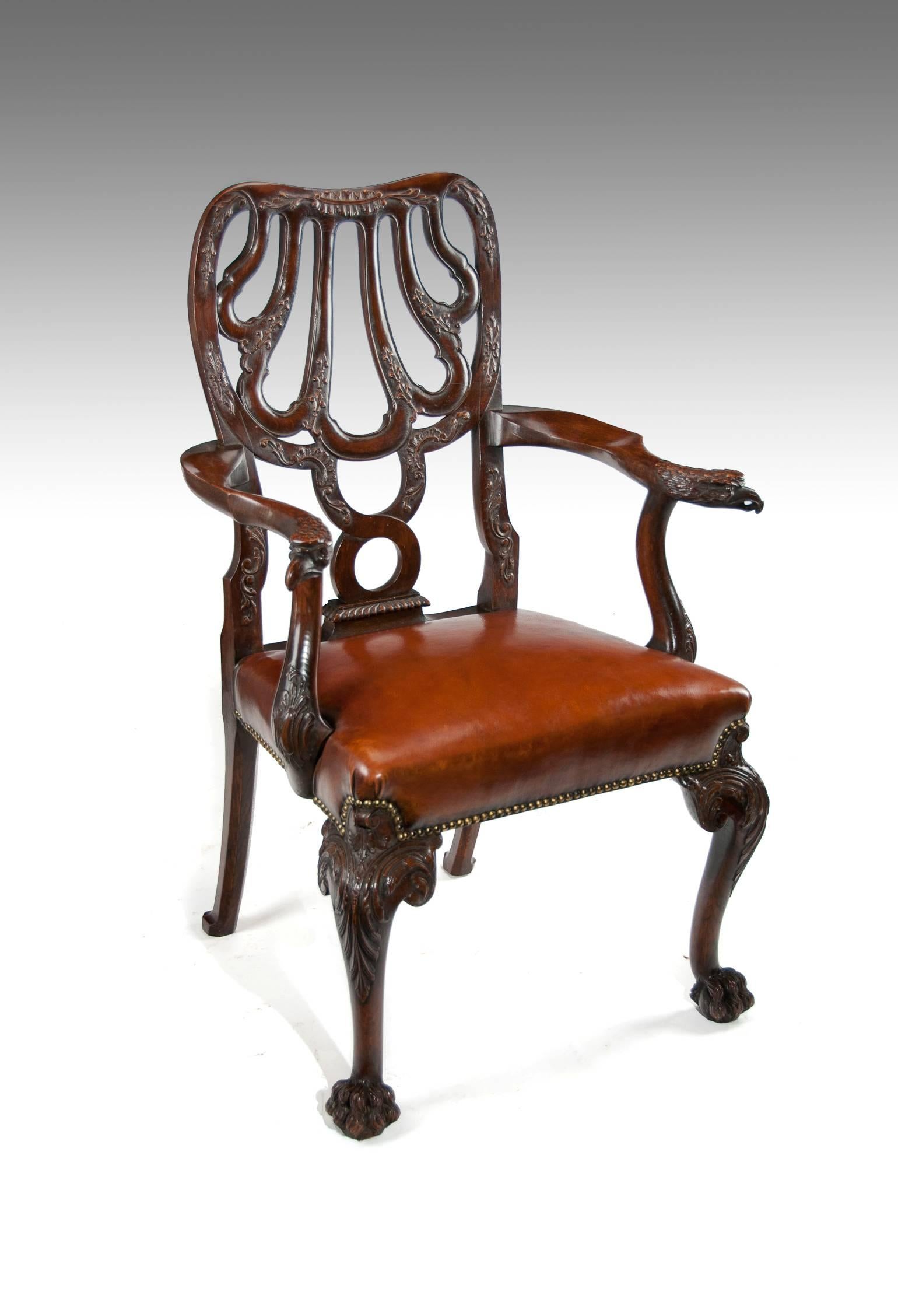 A fine quality 19th century leather upholstered desk, armchair after a design by Giles Grendey (This chair possibly being Irish), circa 1860.
Constructed in the best quality oak almost looking like walnut the hooped back design being of open strap