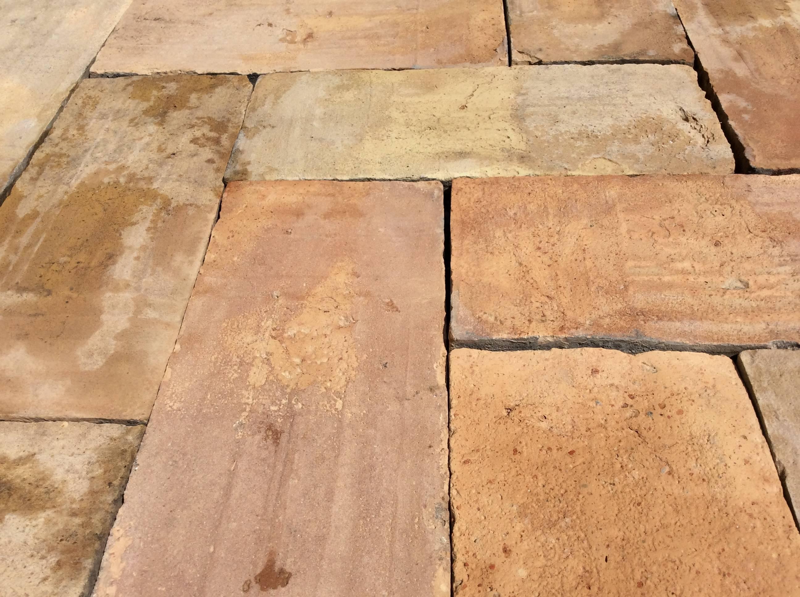 Antique reclaimed terra cotta from French farm houses in Provence, our antique, handmade terra cotta tiles combine the weathered patina, these reclaimed terra cotta tiles are more 100 years old. Available in different shapes and sizes, these tiles