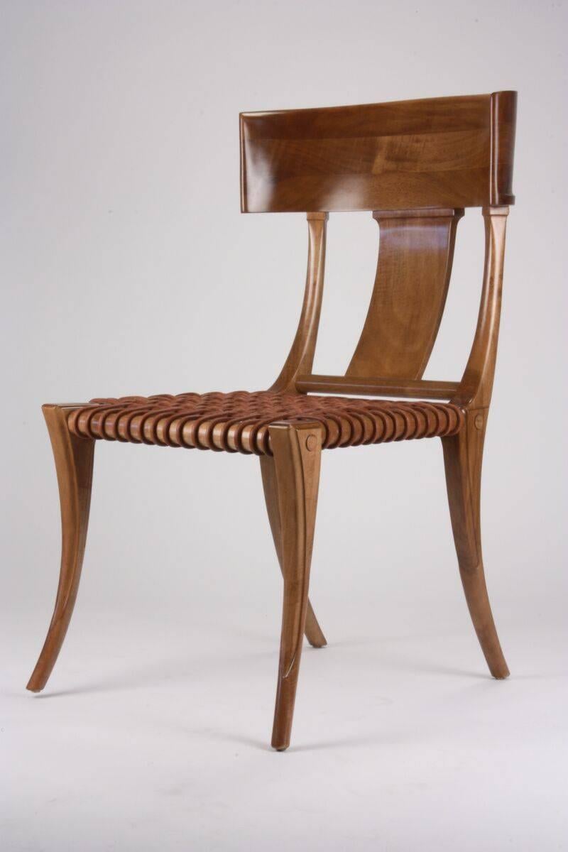 T.H Robsjohn-Gibbings for Saridis of Athens chair model No. 3. Made of Greek walnut. Back constructed with three pieces of walnut dowelled together. Corded leather seat. Cushion not included. Beautiful as a dining chair. 

Each piece is custom