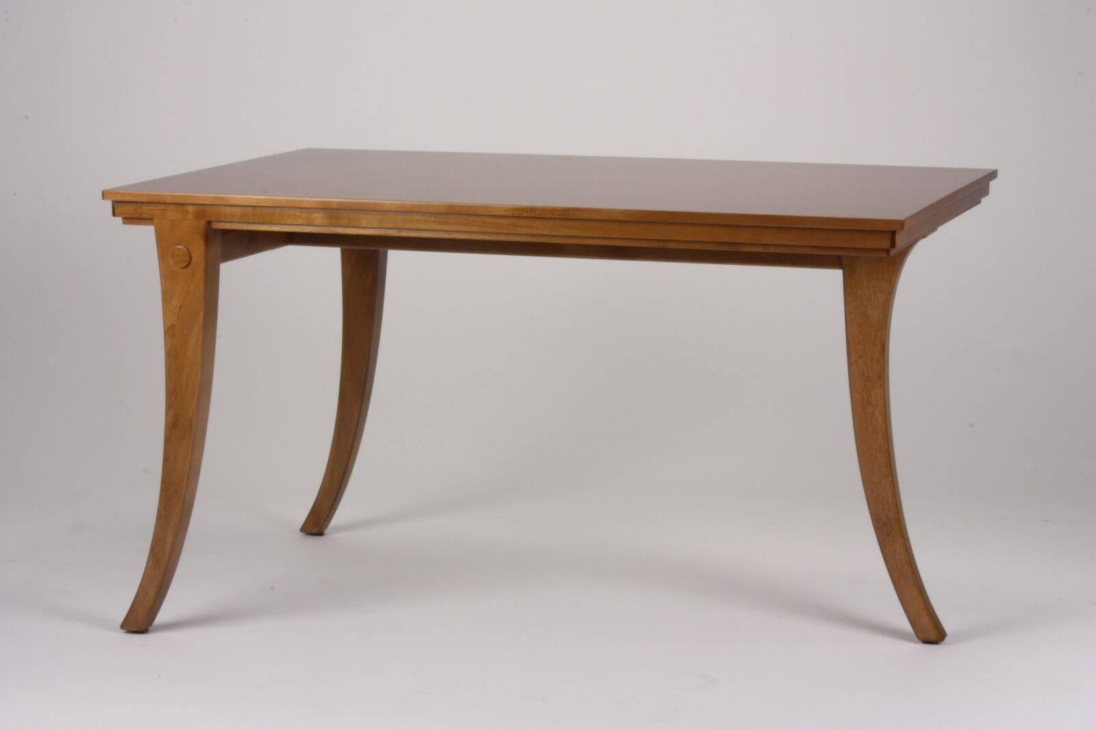 T.H Robsjohn-Gibbings for Saridis of Athens table Model No. 12. Made of Greek walnut with three legs joined by stretchers.

Each piece is custom ordered with a 90 day lead time. 

Emily Summers Studio 54 is the exclusive dealer for Saridis of