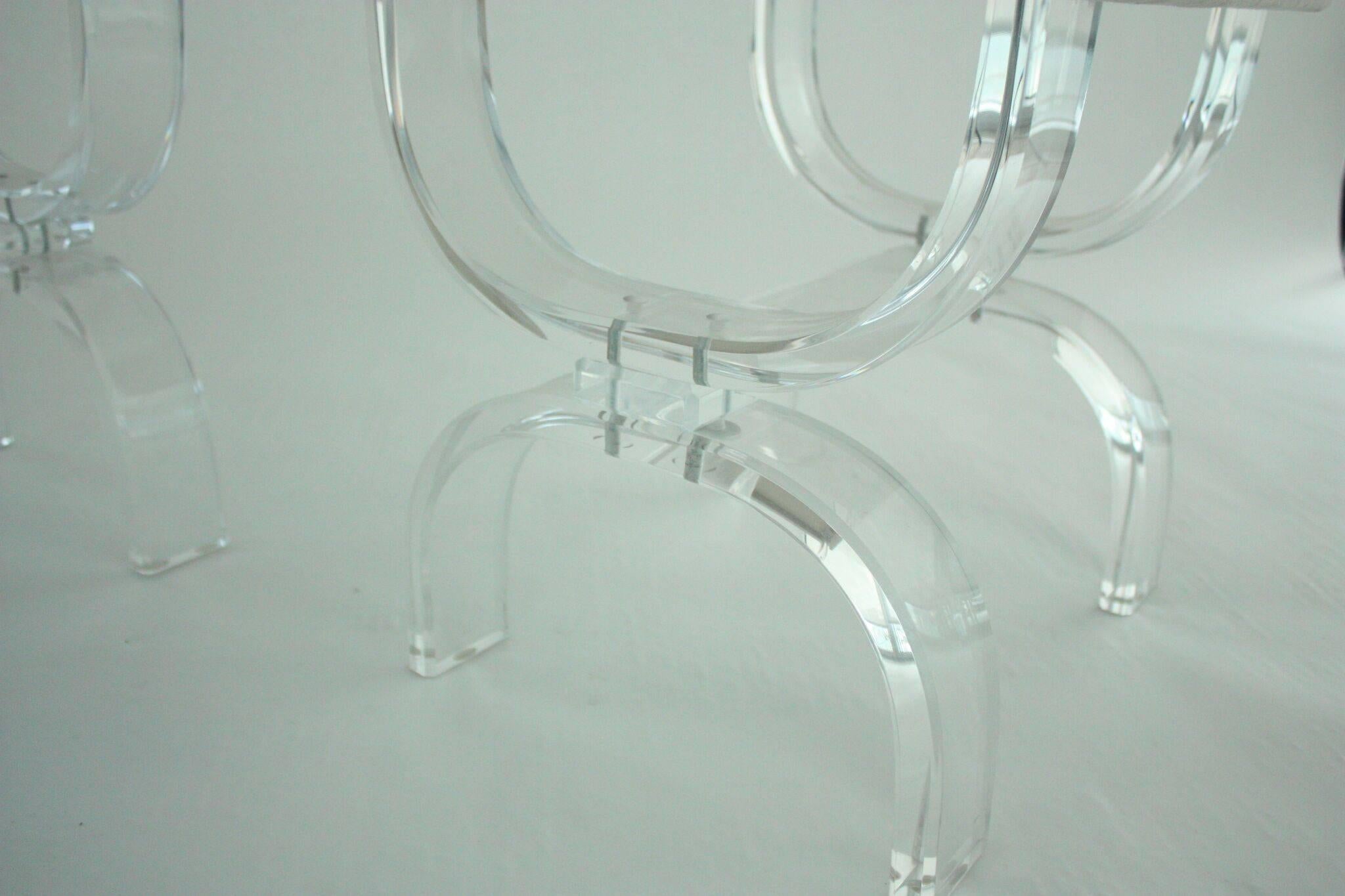 Pair of Midcentury Lucite stools, USA, 1970s. Recently reupholstered in a glazed linen. Very good overall condition.

