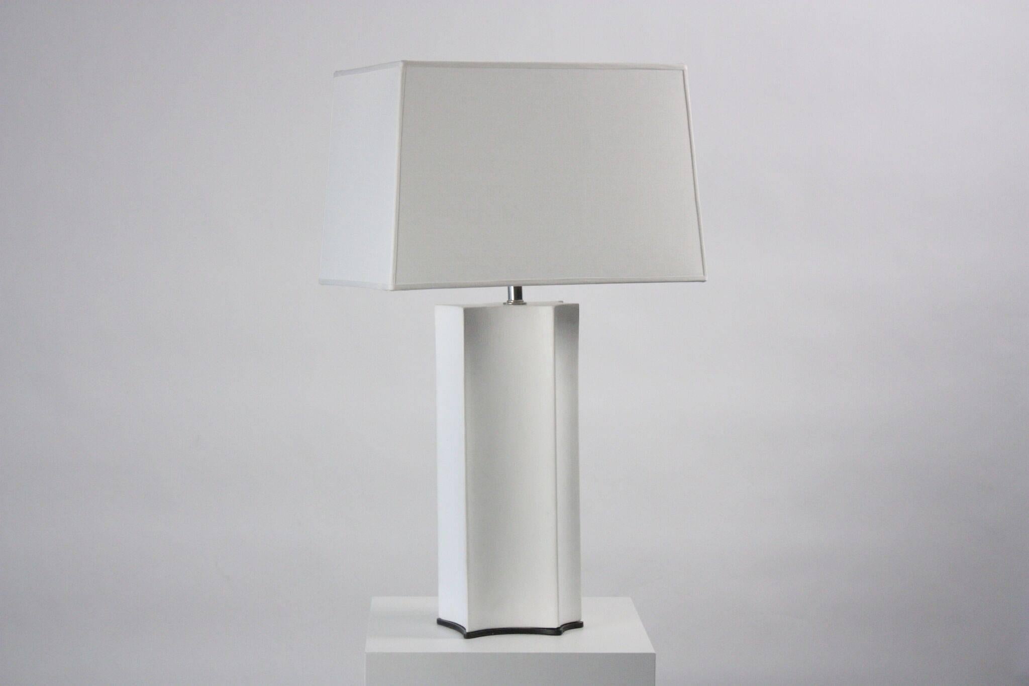 Emily Summers Studio line contemporary, plaster lamp, USA. Plaster, dark steel (shown) and custom shade. 
 
Can be customized with a brass or polished nickel base. 
 
18.5” H x 10” W x 8.5” deep  31.75 tall with shade.


