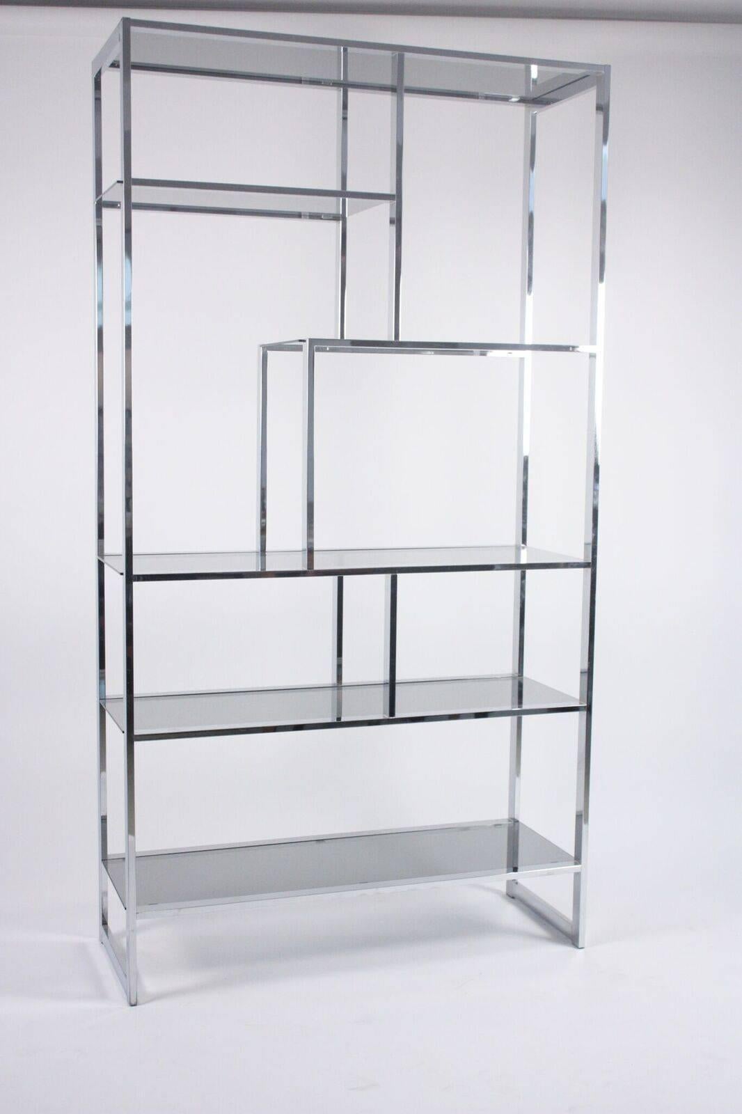 Etagere attributed to Milo Baughman, circa 1970. Chromed metal and smoke colored glass.