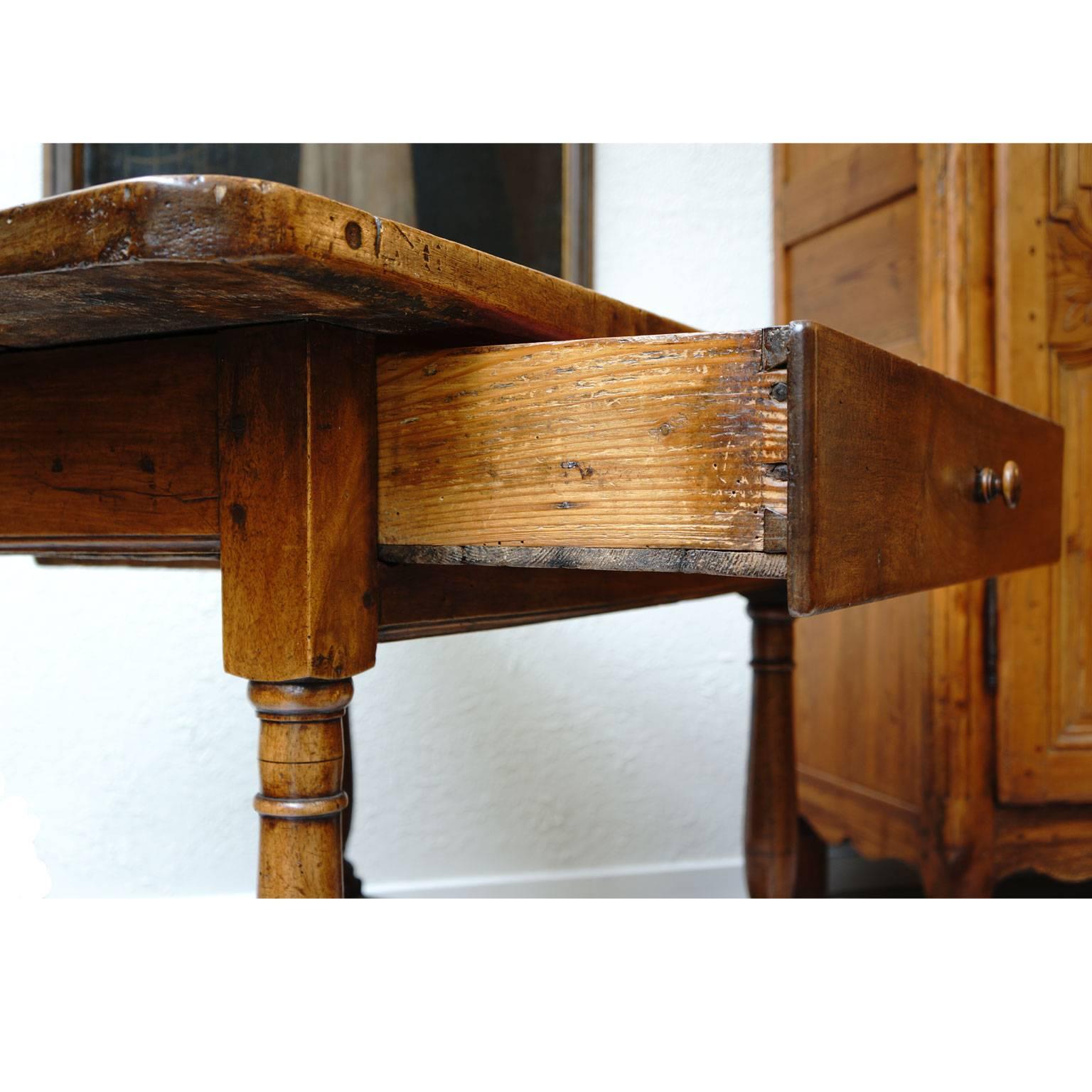 Carved 18th Century French Walnut Table with Turned Legs For Sale