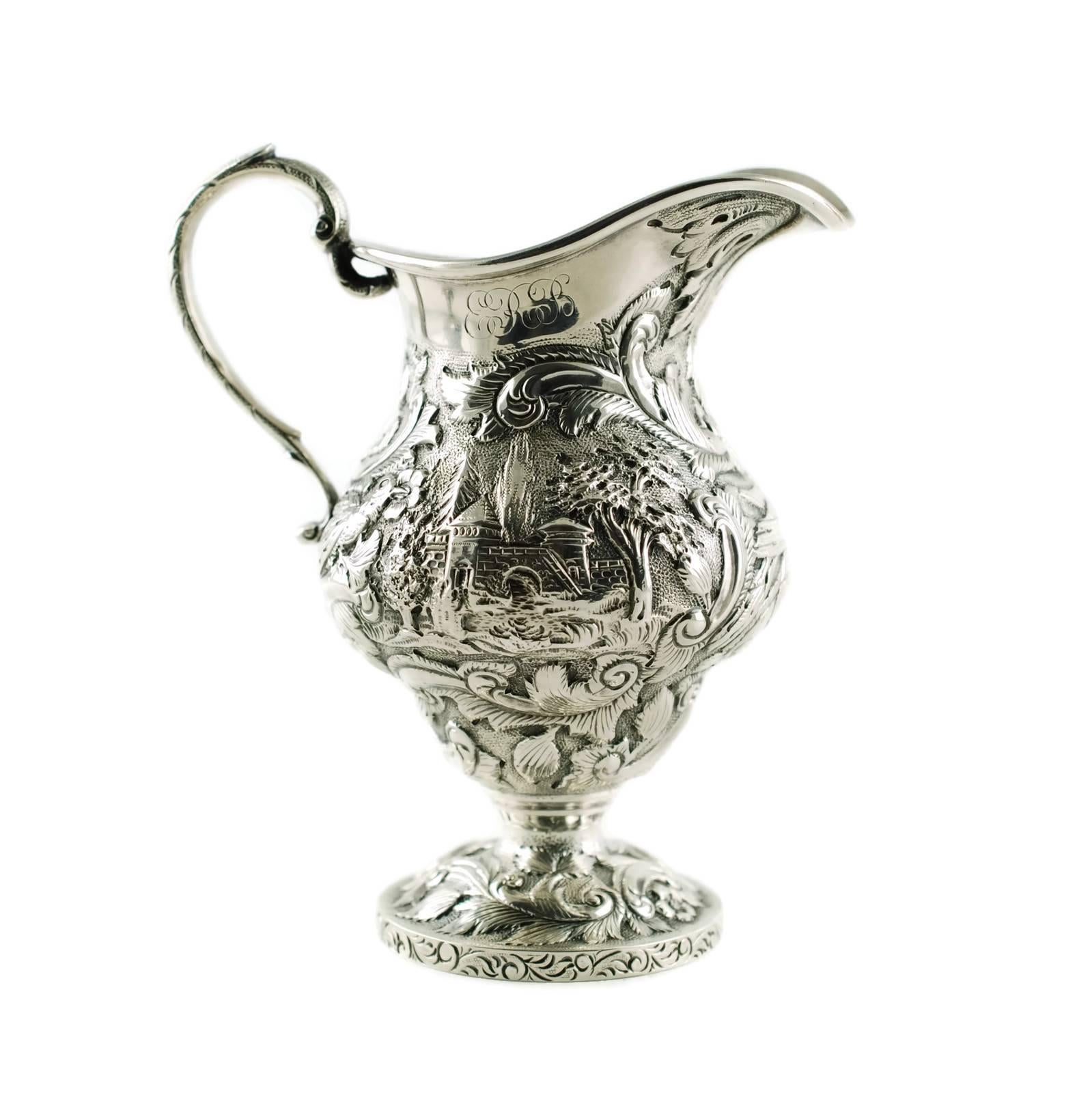 American Sterling Silver Loring Andrews Three-Piece Repousse Castle Pattern Tea Set