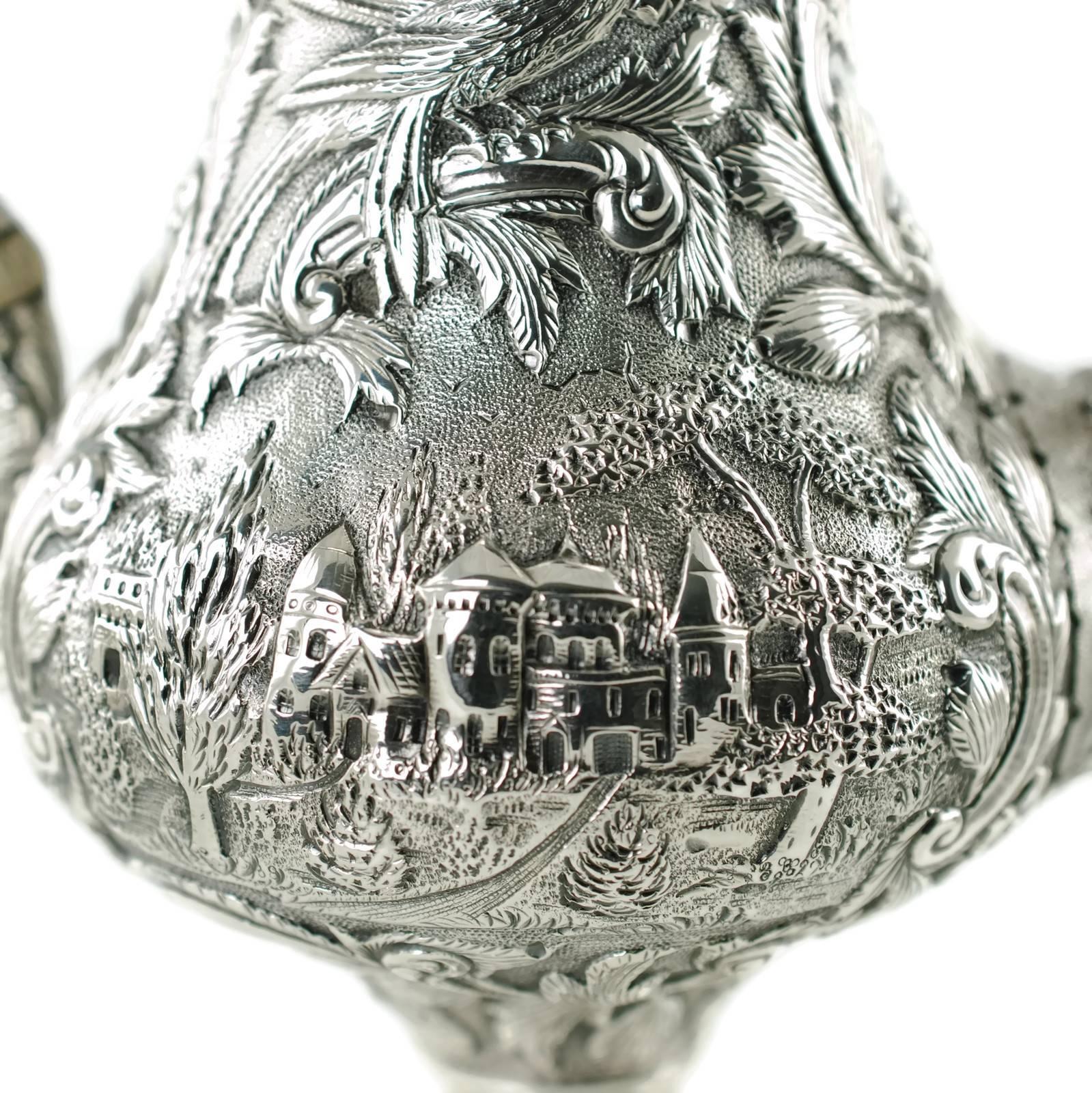 Victorian Sterling Silver Loring Andrews Three-Piece Repousse Castle Pattern Tea Set