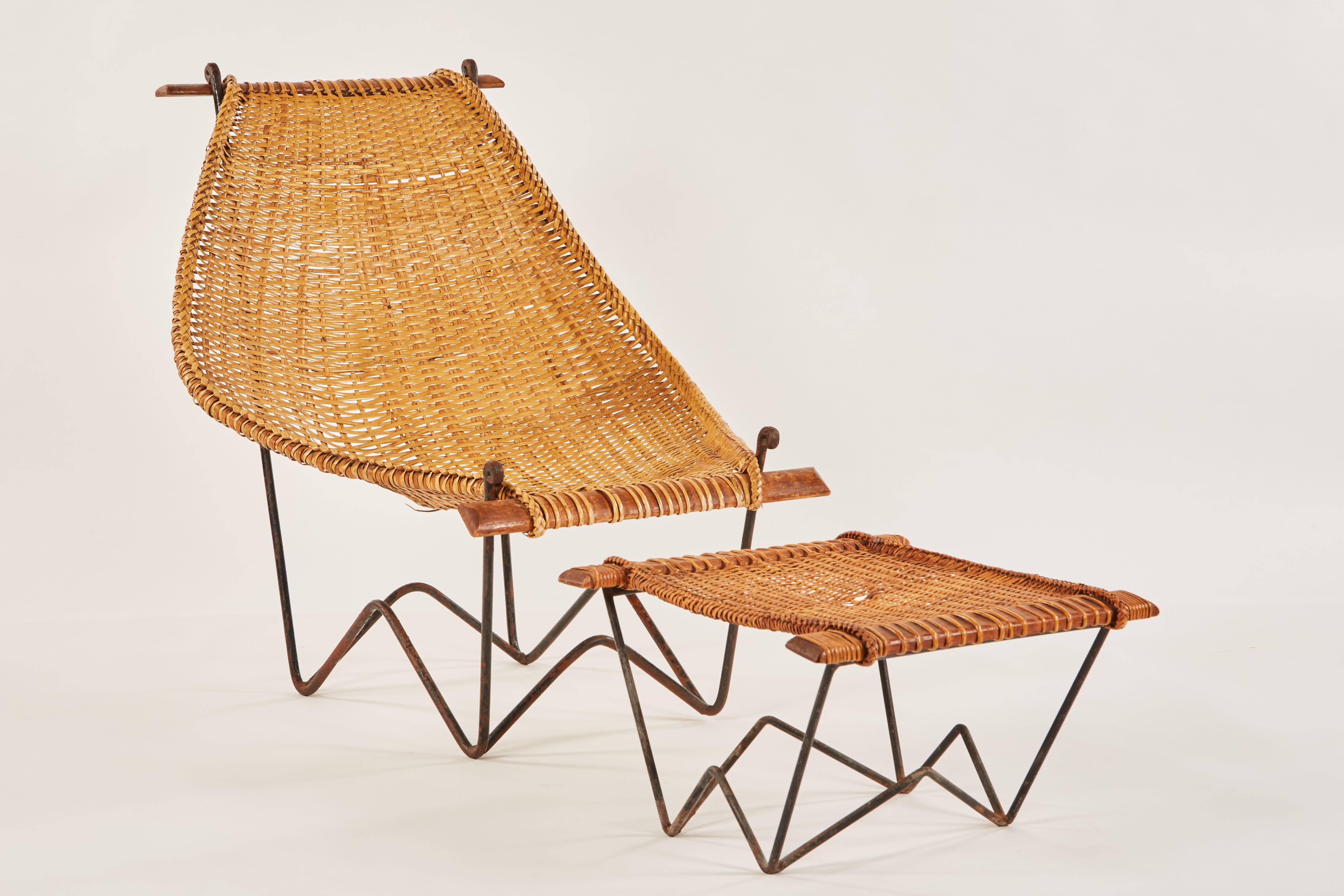 Early Duyan rattan and iron lounge chair and ottoman by John Risley. Made in USA, circa 1950s.

Ottoman measures 23" W x 23" D x 13" H.