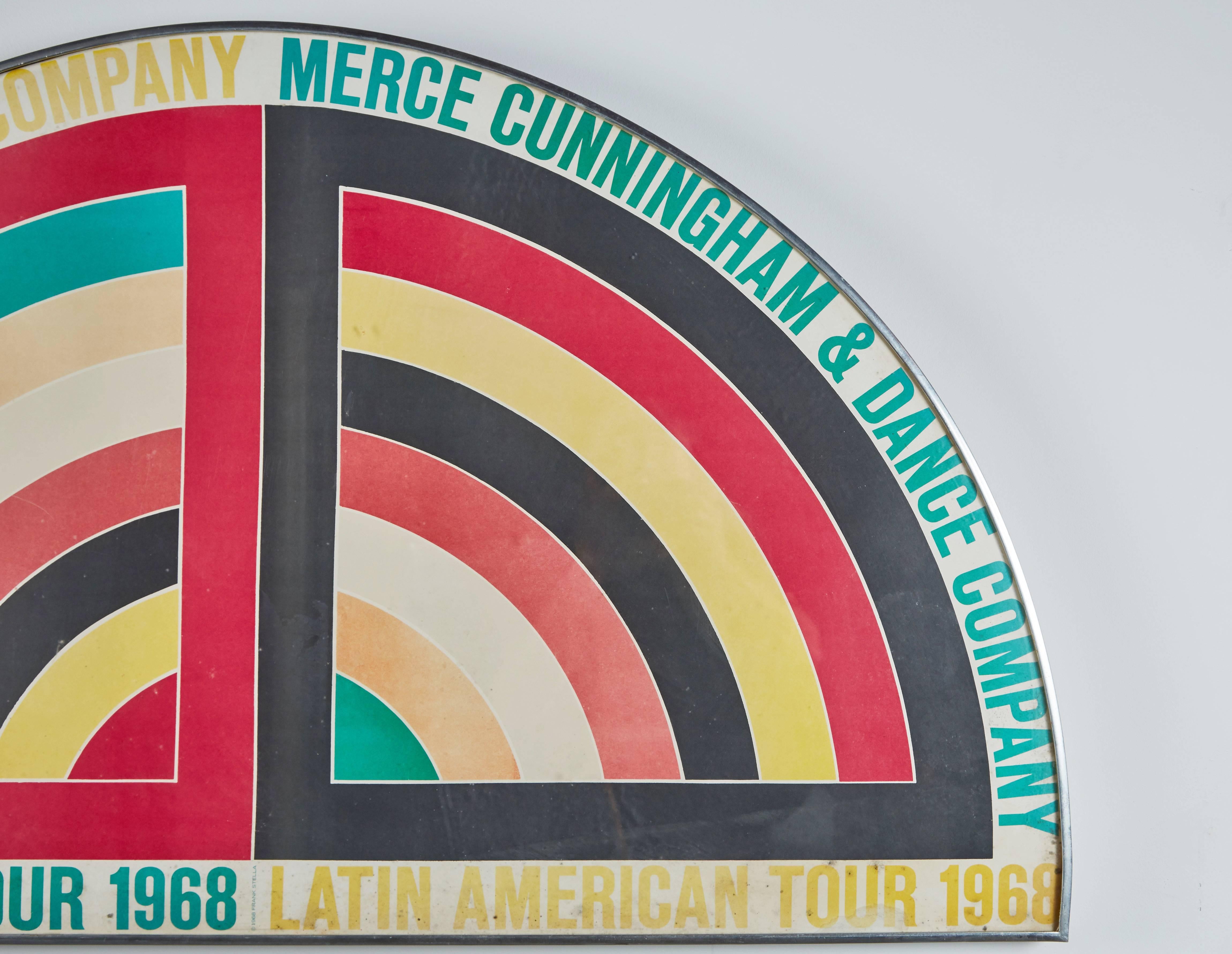 Original exhibition poster for the Merce Cunningham Dance Co. Latin American tour designed and created by Frank Stella. Framed half-moon shape with imagery based off of Stella's Protracter series. Made in USA, circa 1968.