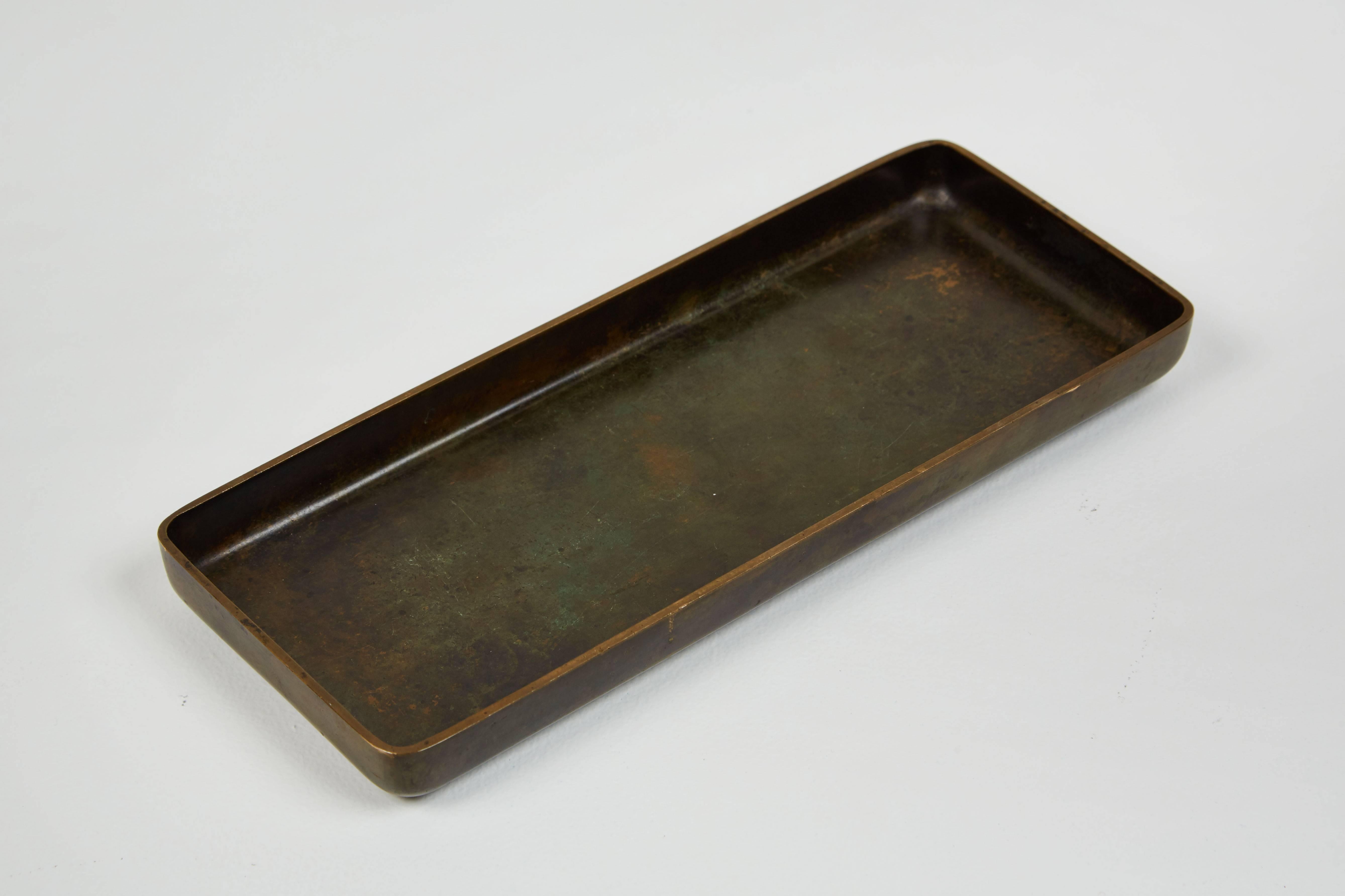 Solid bronze footed tray by Just Andersen, made in Denmark, circa 1930s.