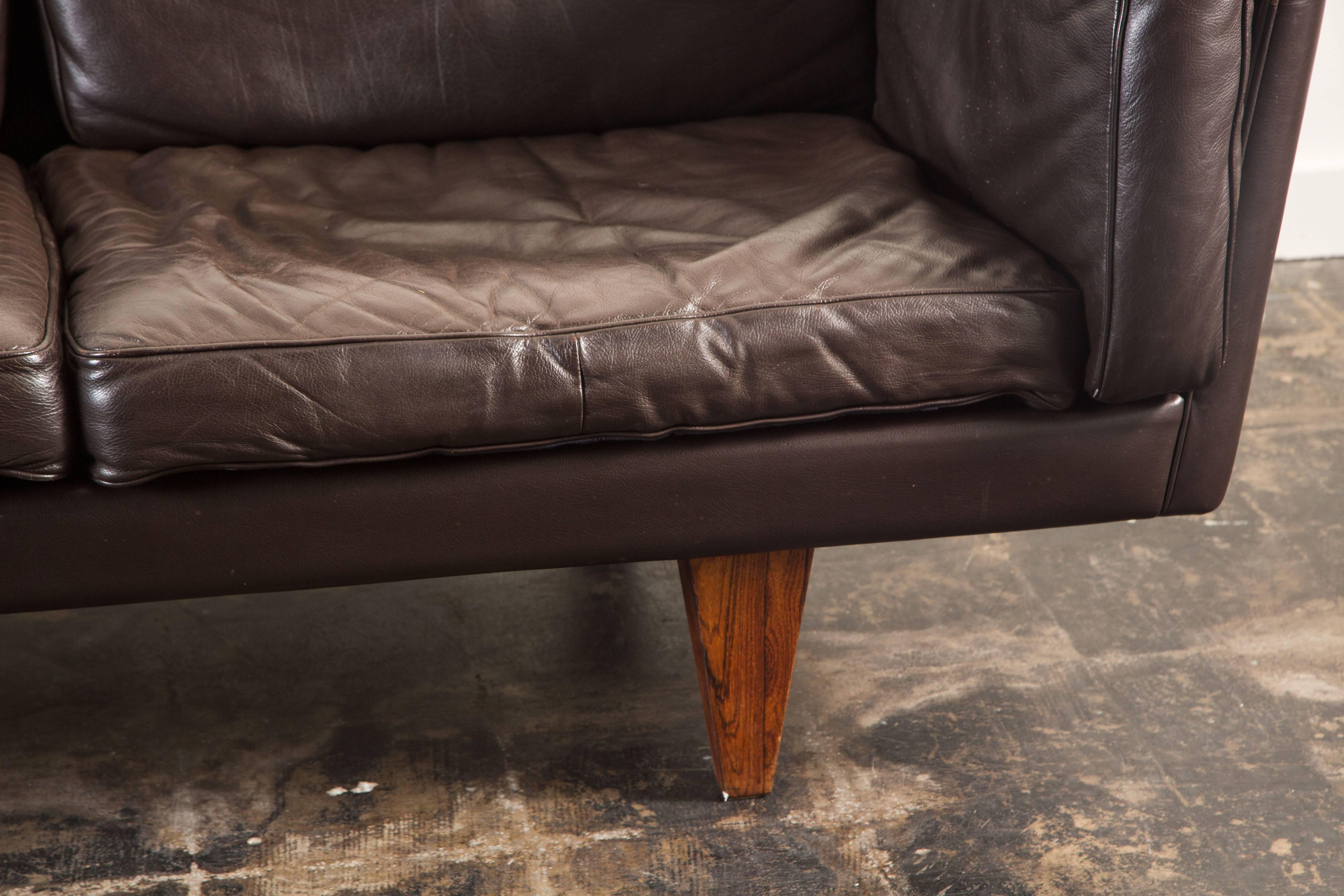 Leather and Rosewood Sofa by Illum Wikkelsø 4