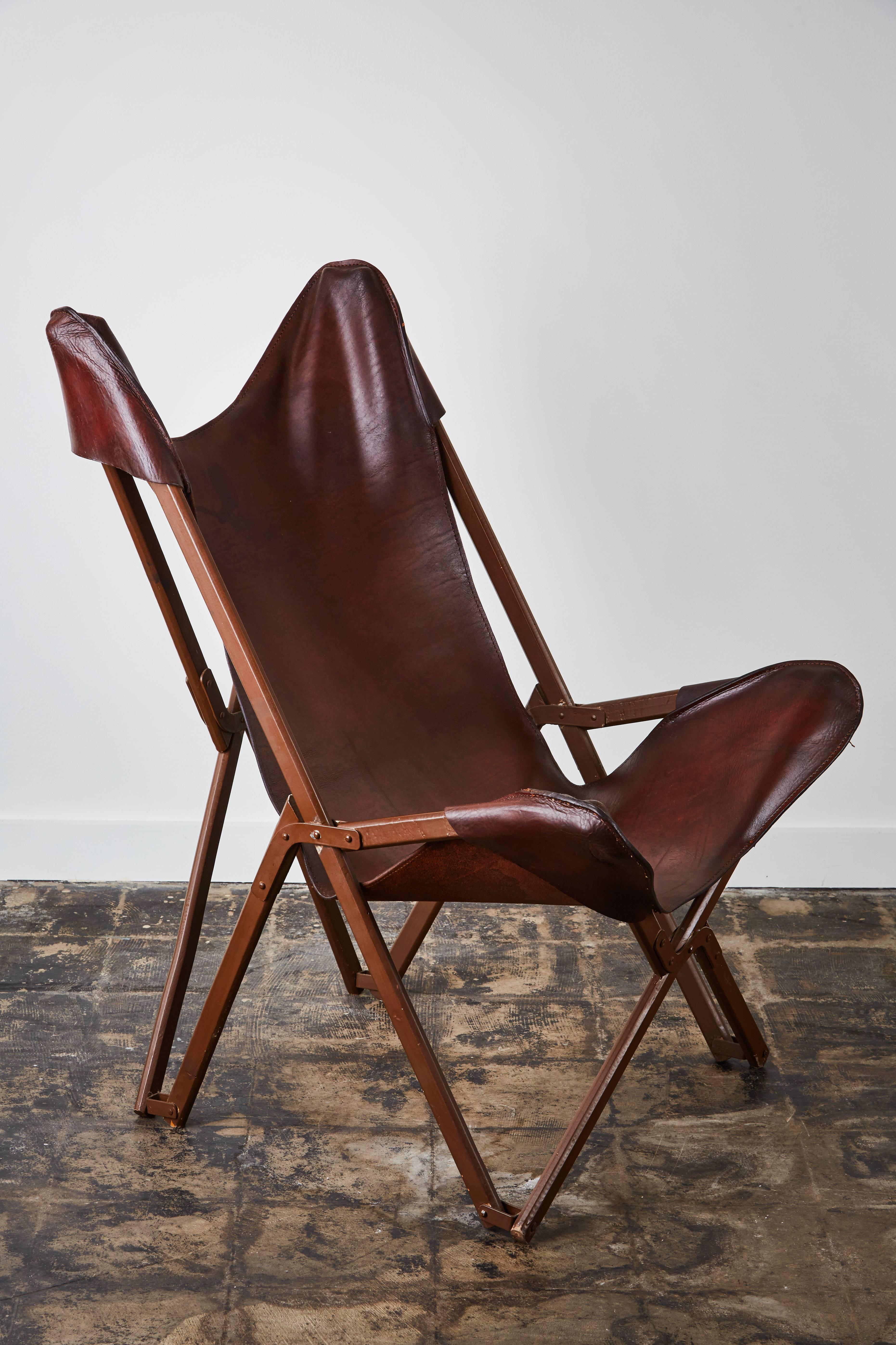 Rare leather tripolina folding chair designed by Joseph Fendy for Vigano. Beautiful patina to leather. Made in Italy, circa 1950s.