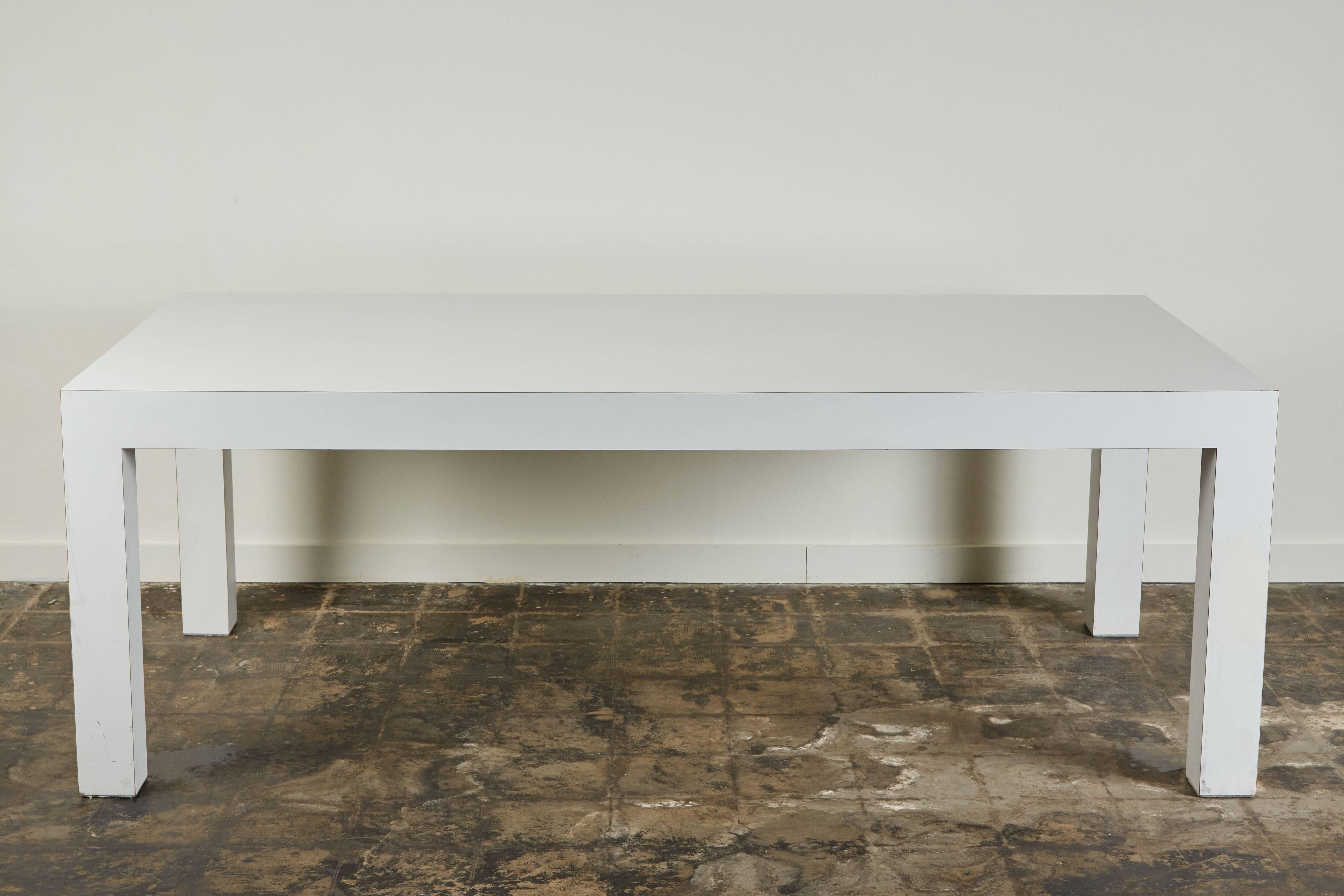 Solid wood Parsons dining table with white laminate. Made in USA, circa 1970s.
 