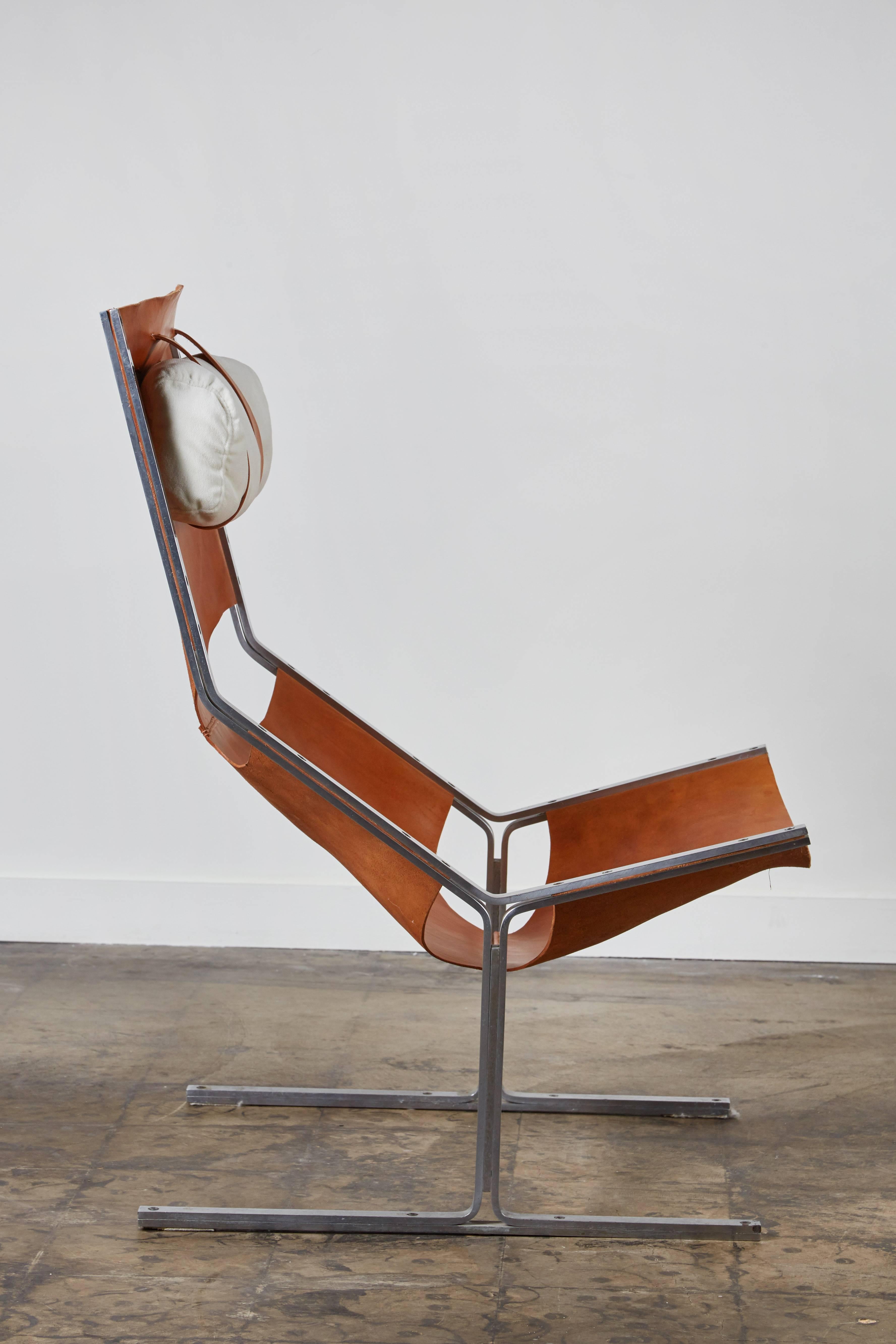 Rare cognac leather and brushed steel lounge chair manufactured by AP Originals, Abraham Polak Meubelindustrie and sold at the time by Metz & Co in Amsterdam.