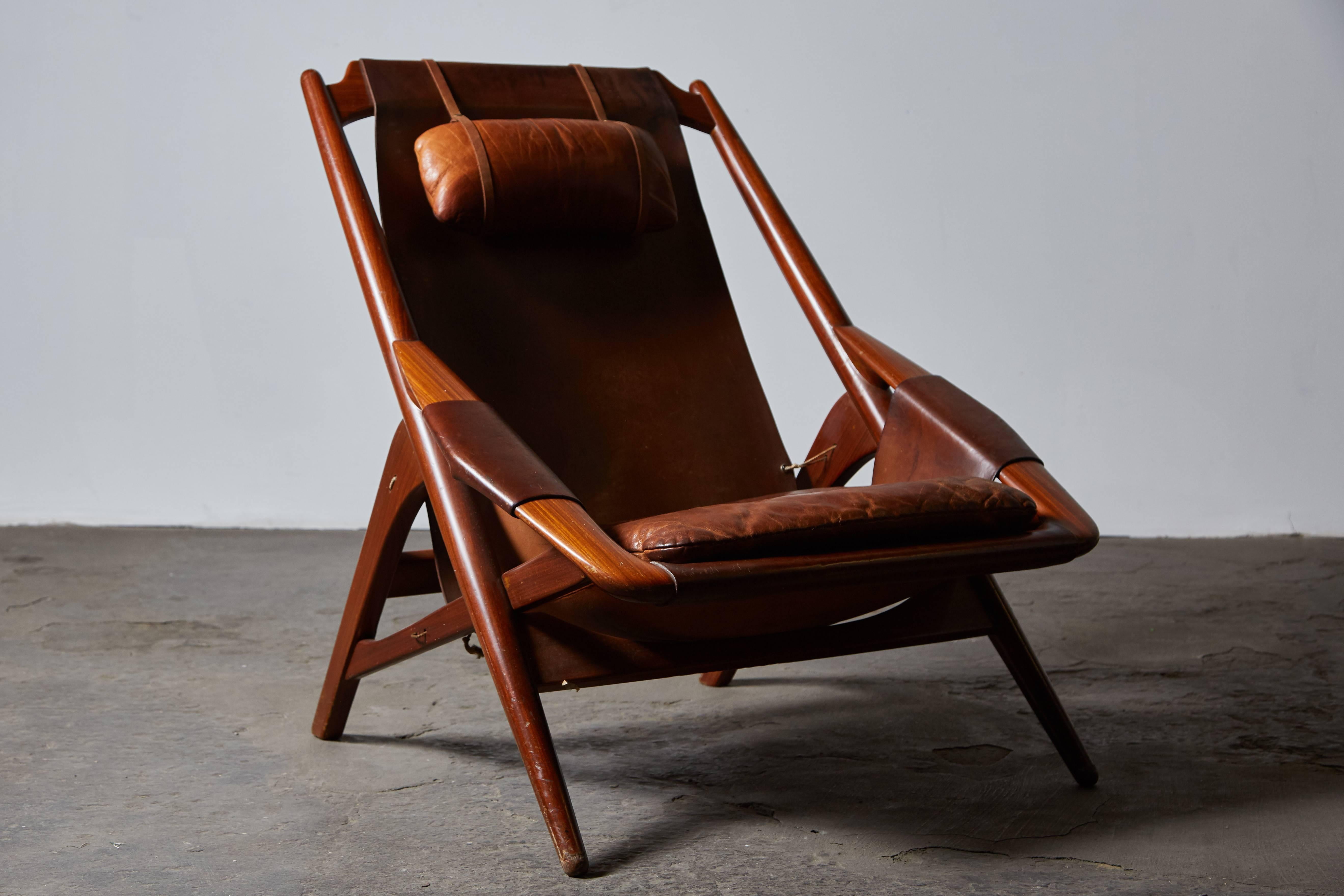 Patinated leather lounge chair by W.D. Andersag for Ideal Piacenza in Brescia, Italy, circa 1950s.