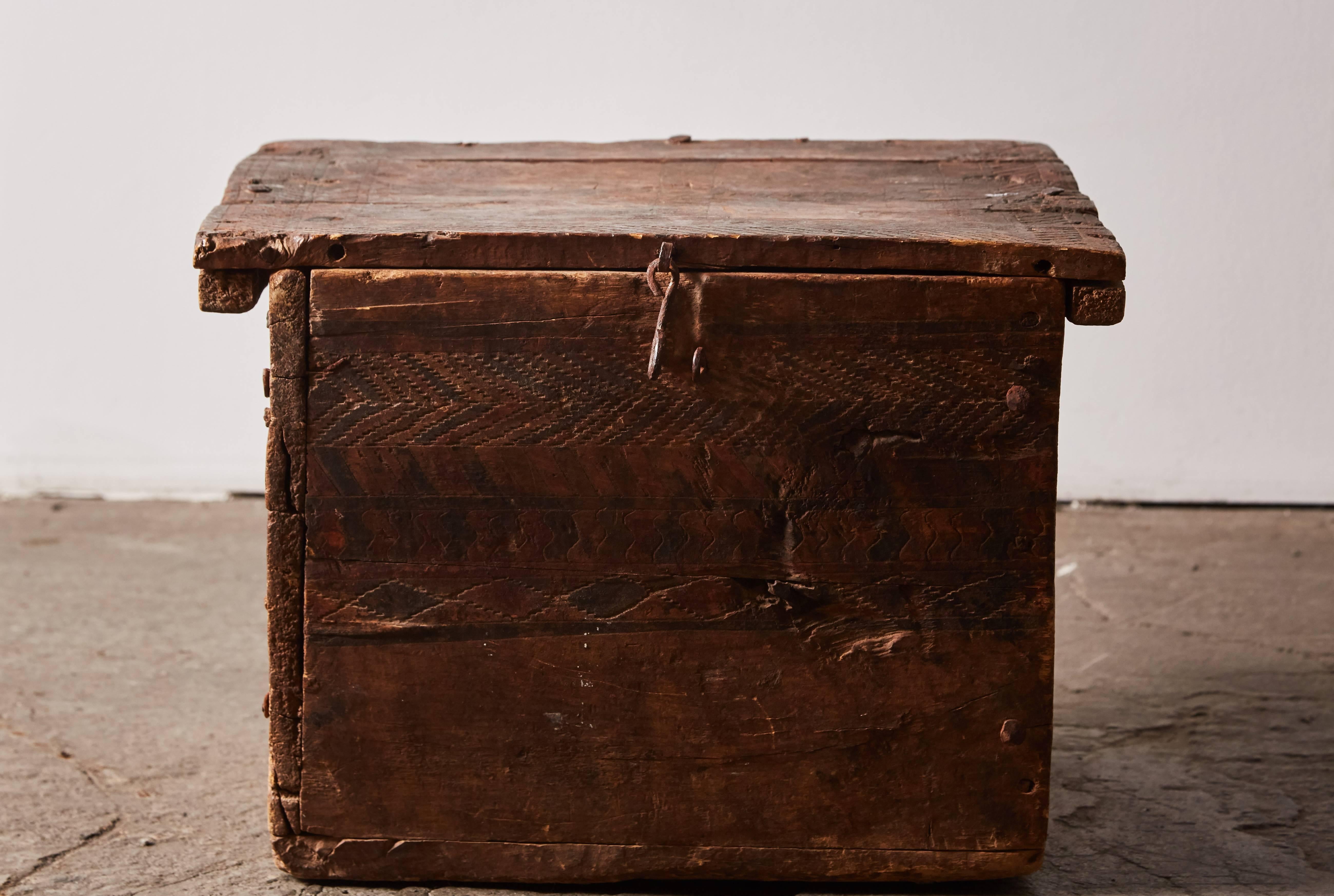 Primitive hand-carved and painted latched box with viking imagery. Made in Russia, circa 1850s.