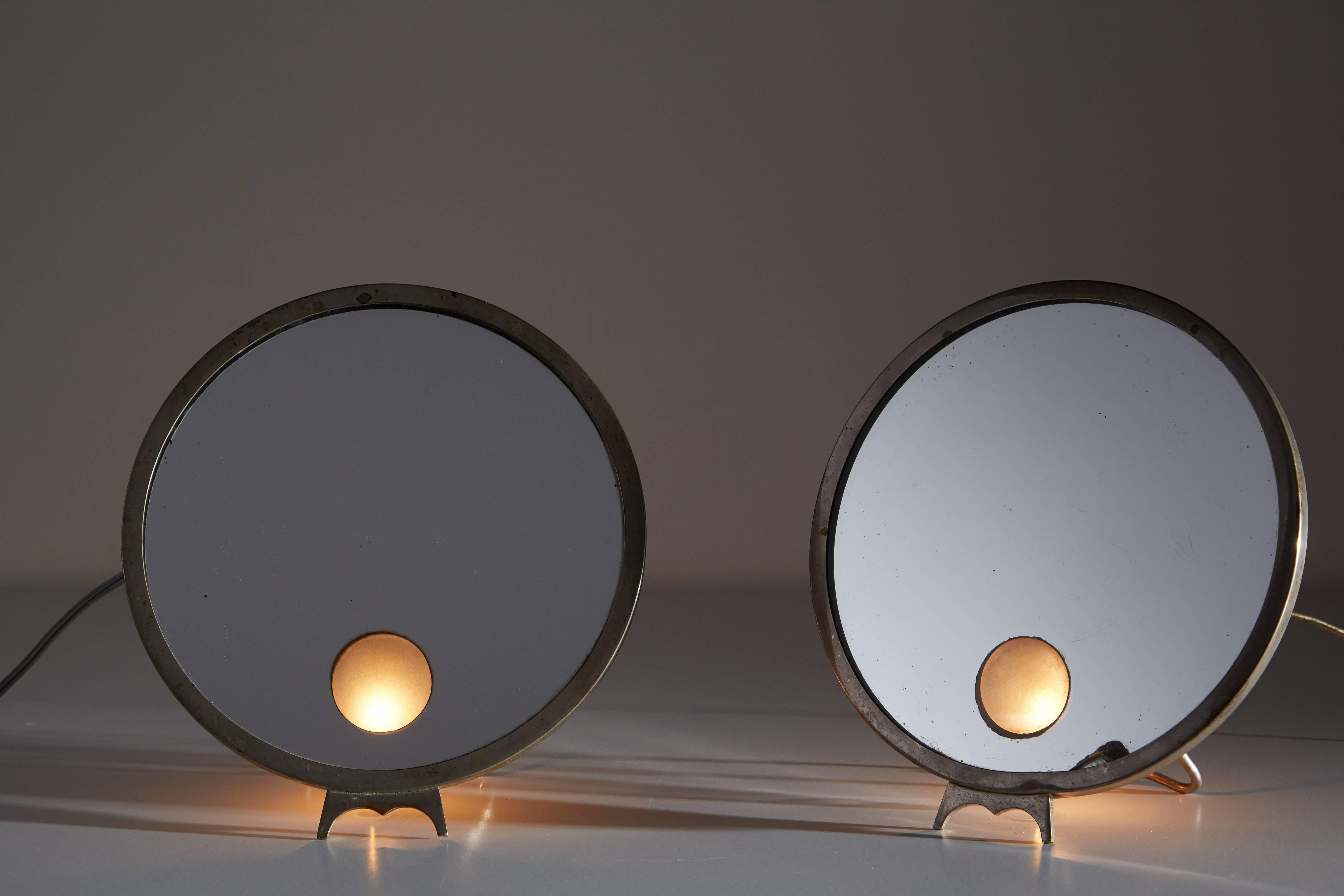 Pair of 'Le Mirophar' illuminated table mirrors with plated nickel frames. Made in Paris, France, circa 1930s.

 