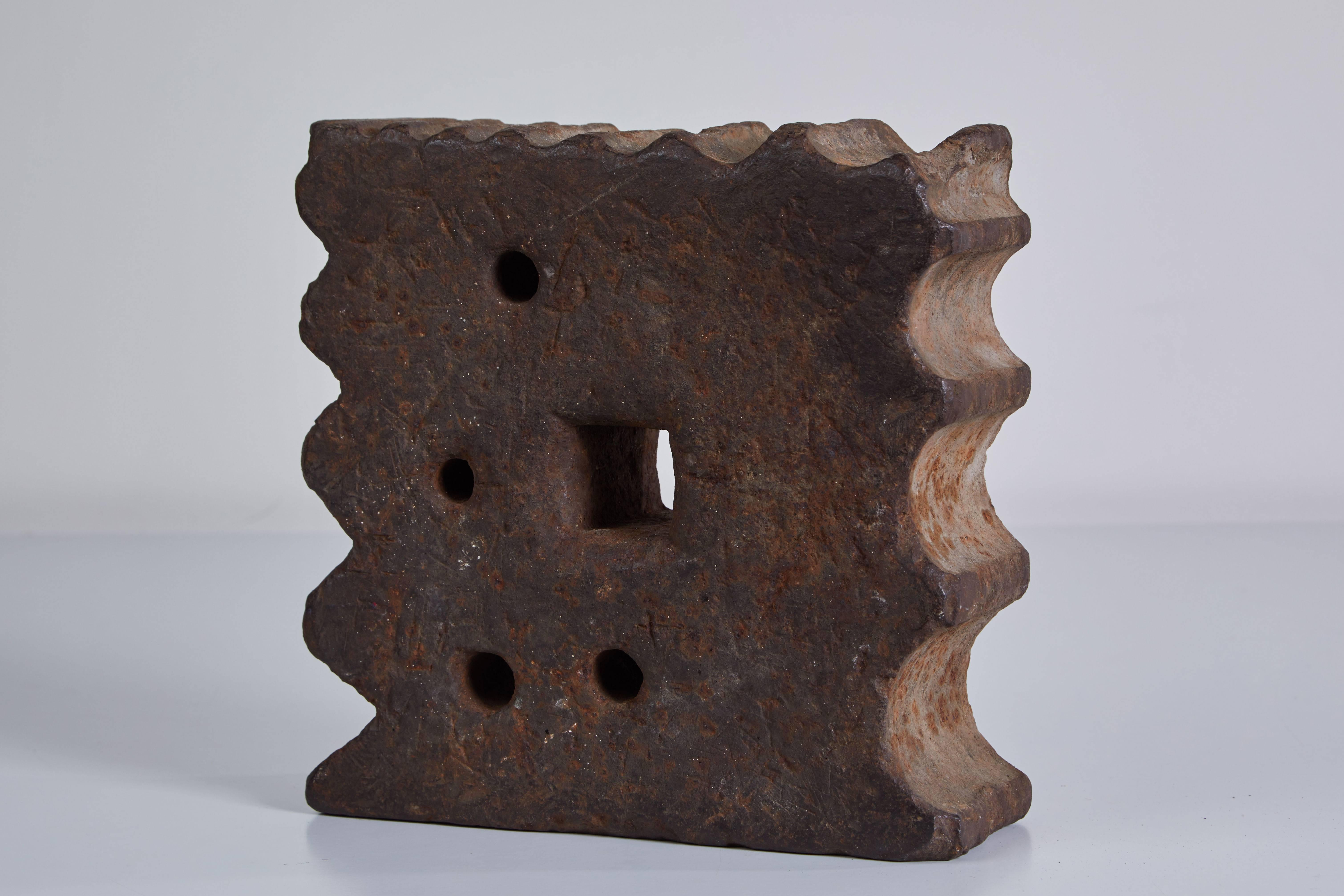 Sculptural cast iron Industrial swage block used by blacksmiths machinists for shaping iron. Made in USA, circa 1920s.