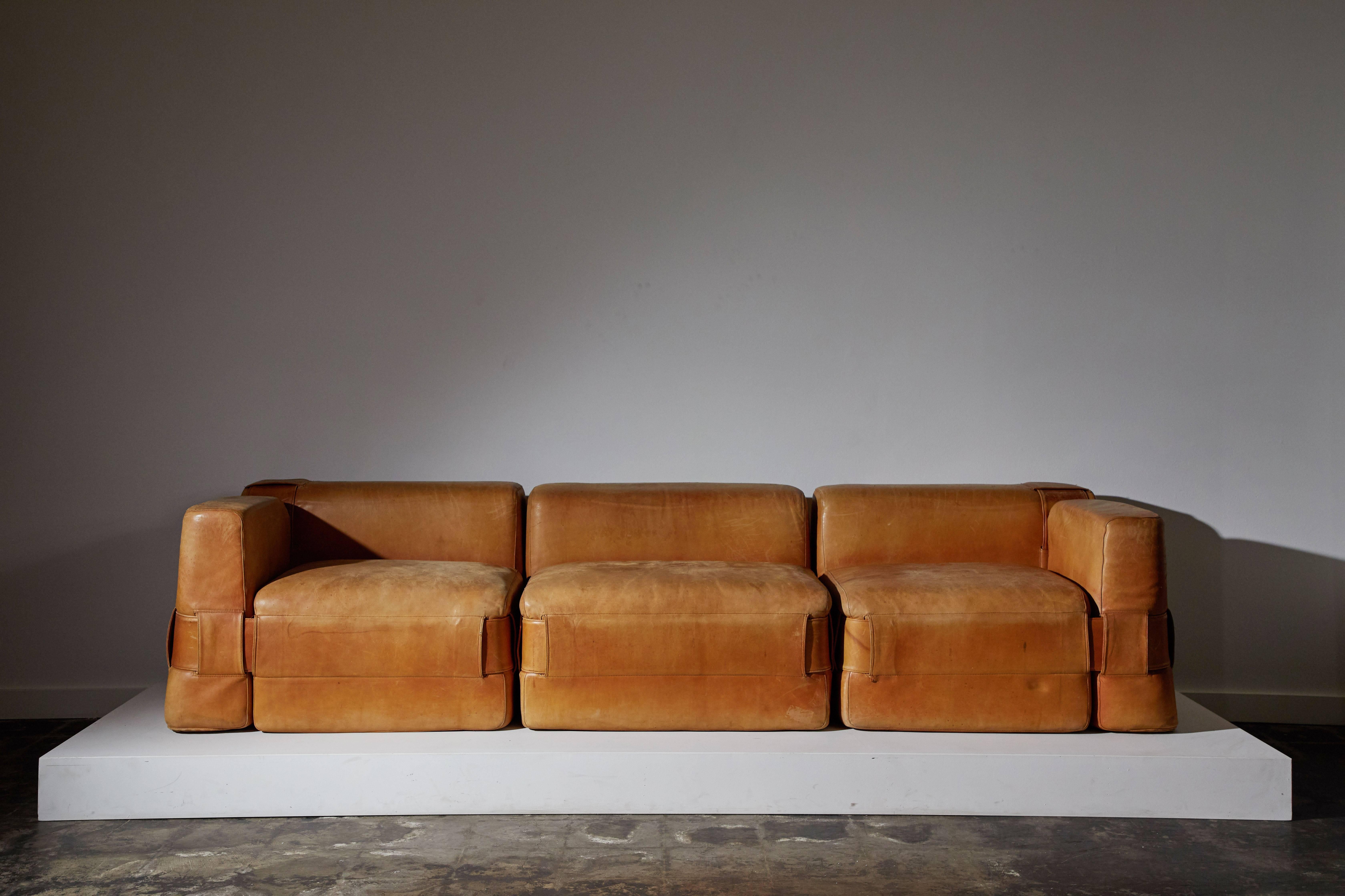 Patinated leather 932 modular sofa range by Mario Bellini for Cassina. Made in Italy circa 1965. 

Armchair also available in separate posting.

