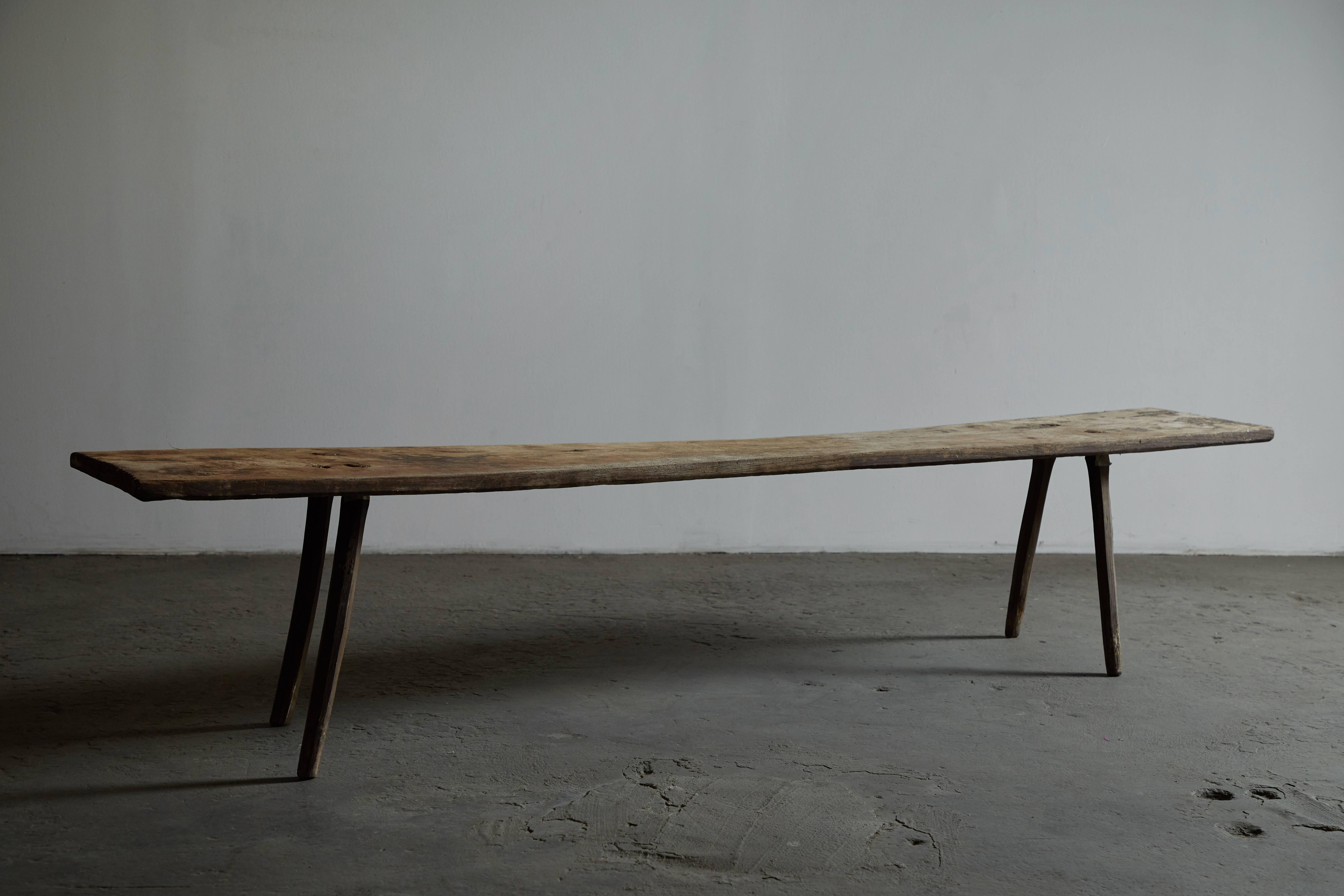 Long Primitive Wood Bench In Distressed Condition In Los Angeles, CA