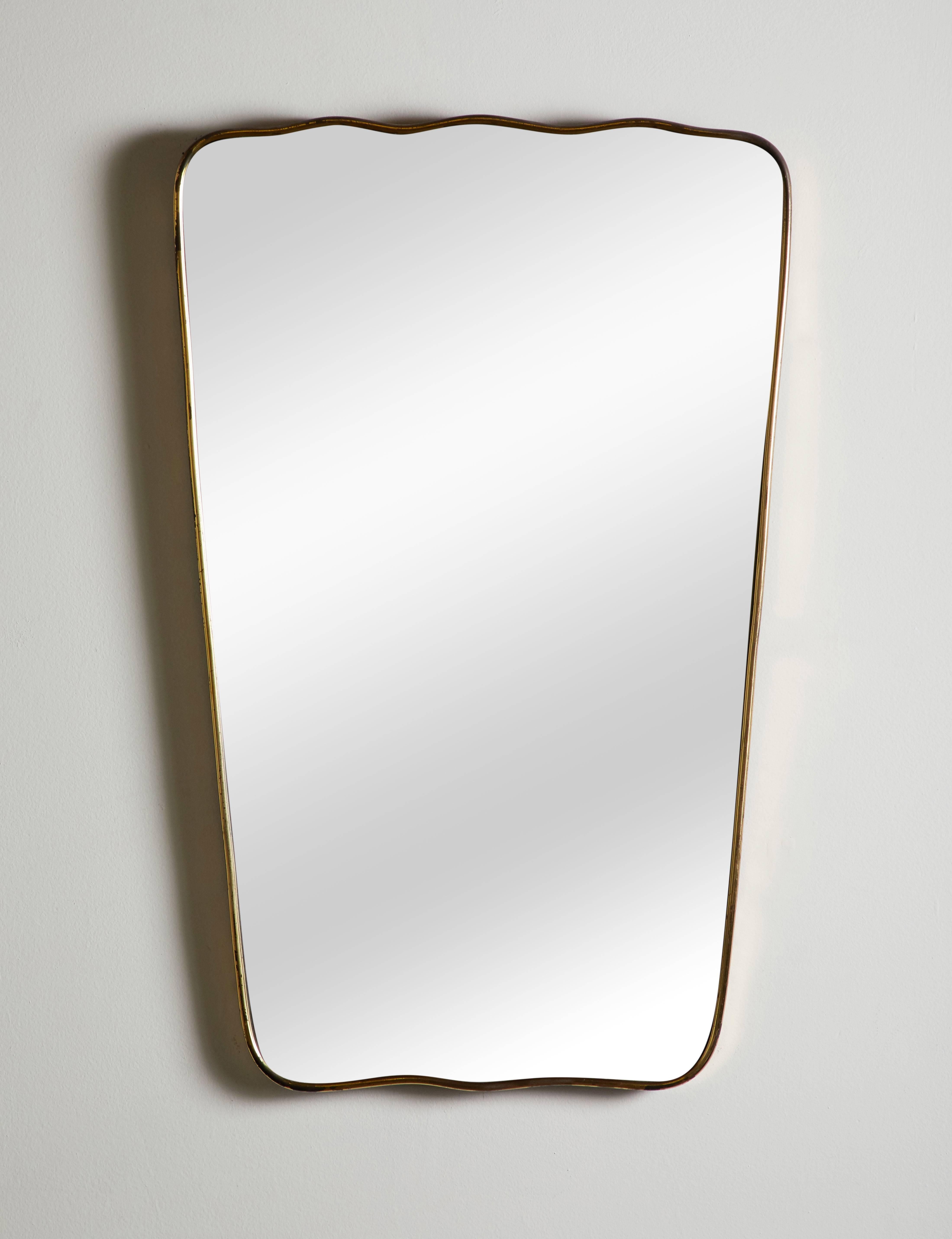 Italian patinated brass framed mirror. Made in Italy circa 1960s.