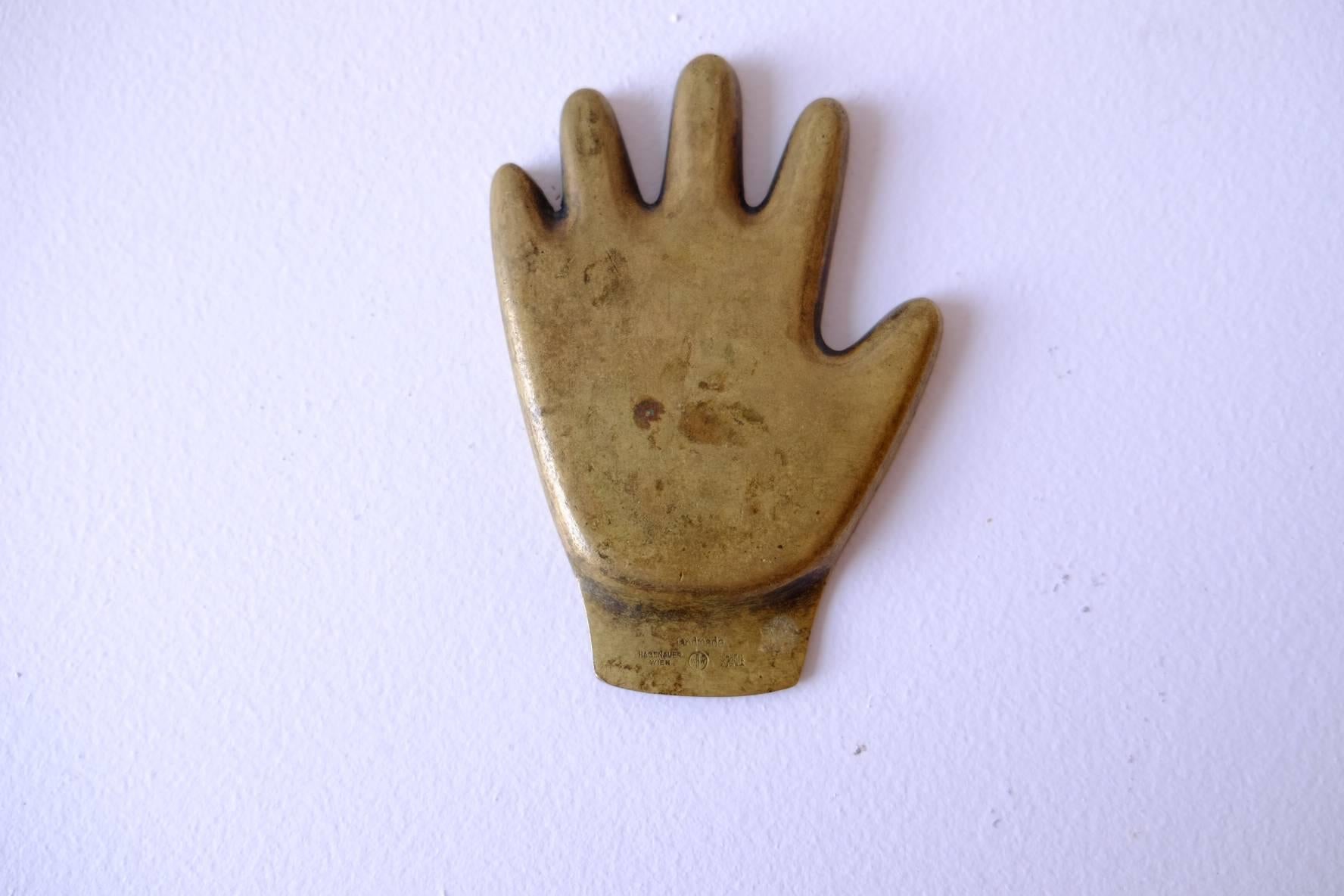 Hand shaped brass tray with patina by Hagenauer Werkstätte. Handmade and signed in Austria, circa 1940s.