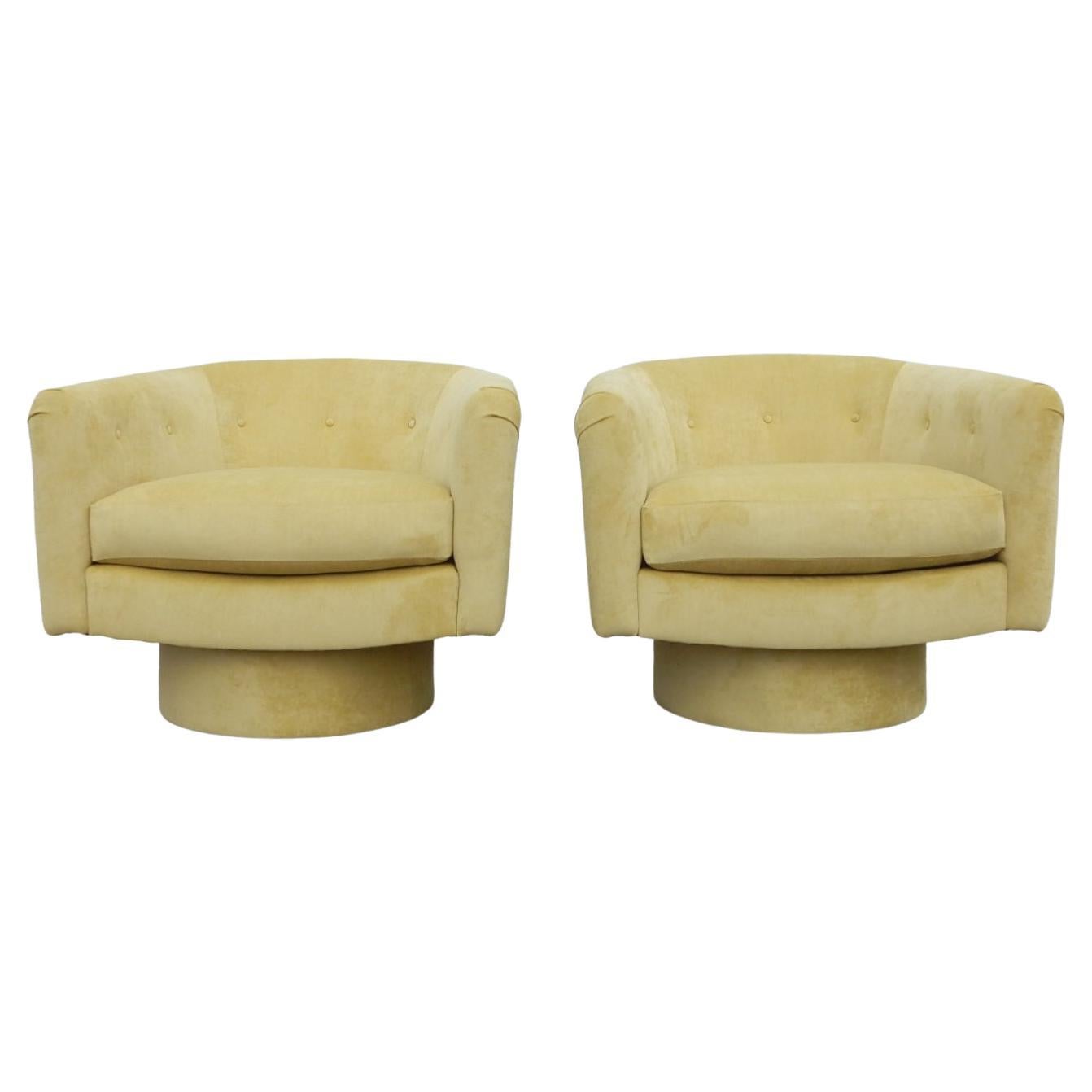 A pair of petite swivel lounge chairs designed in the style of Milo Baughman.
We just had them professionally reupholstered in a canary yellow velvet.
Like new condition ready to be enjoyed on delivery.
 