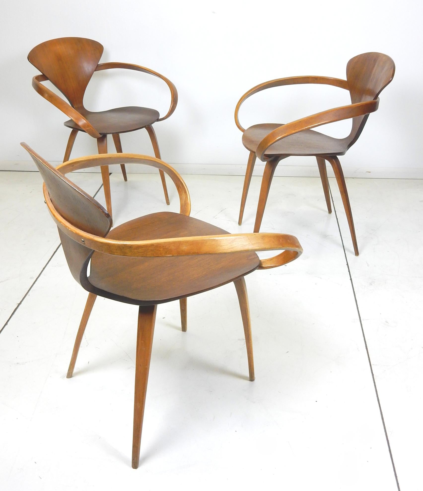 1950's  Pretzel arm chair designed by Norman Cherner for Plycraft.
3 available.
All three are completely original and unmolested examples of this iconic chair.
All are solid, usable and fabulous.
Own an original, not a reproduction.
  