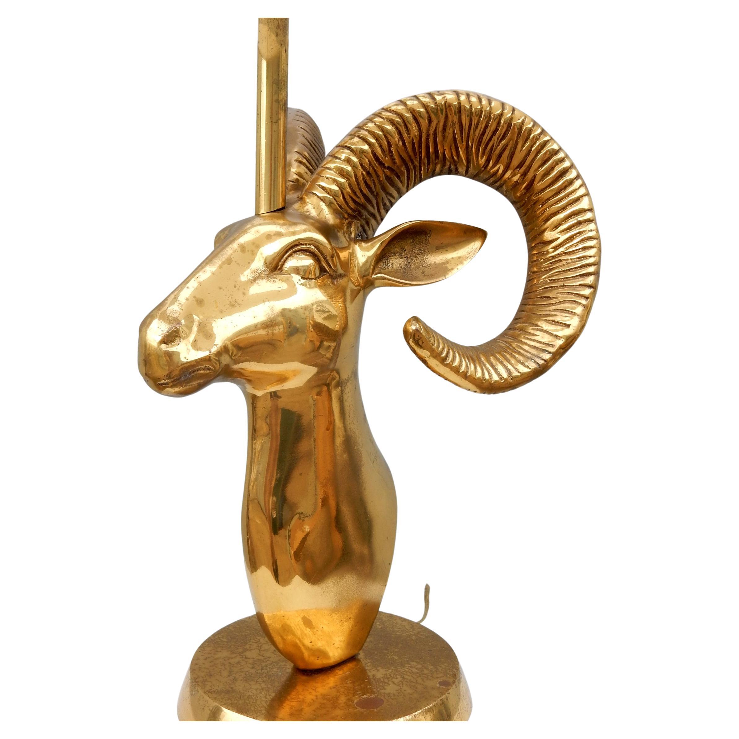 Brass Rocky Mountain Sheep bust sculpture/table lamp. 
A striking piece of functional art from the 1970's.
Bust stands 17 inches tall to tip of horns (31 inch tall to the tip of finial)
Aged patina on brass. No damage, dents etc.
Perfect working