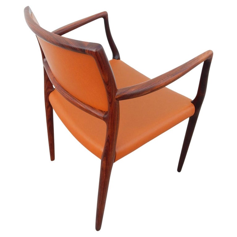 Mid Century Danish Modern Niels Otto Møller Sculpted Rosewood Dining Chairs In Good Condition For Sale In Las Vegas, NV
