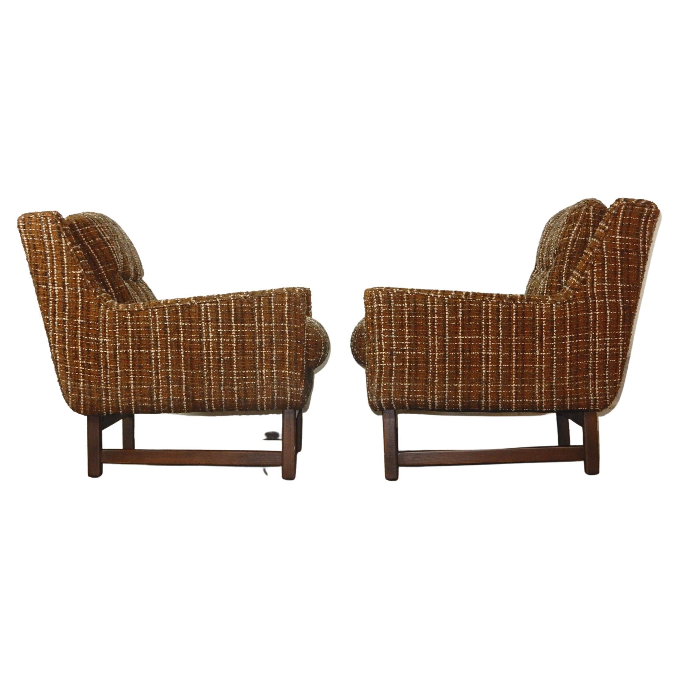Sexy petite pair of original 1960s lounge chairs in their original nubby wool weave upholstery.
In the style of Jens Risom, they are exceptionally comfortable and plush.
Upholstery and foam are soft. Frames are solid with original dark walnut