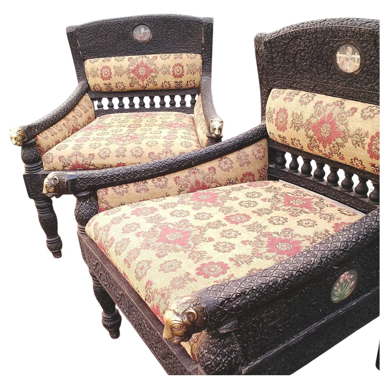 Fabulous & exotic lounge chairs with solid brass panther head hand rests.
Hand-painted and hand-carved. Ceremonial man and woman medallions
in center of back.
These are completely original with no alterations.
