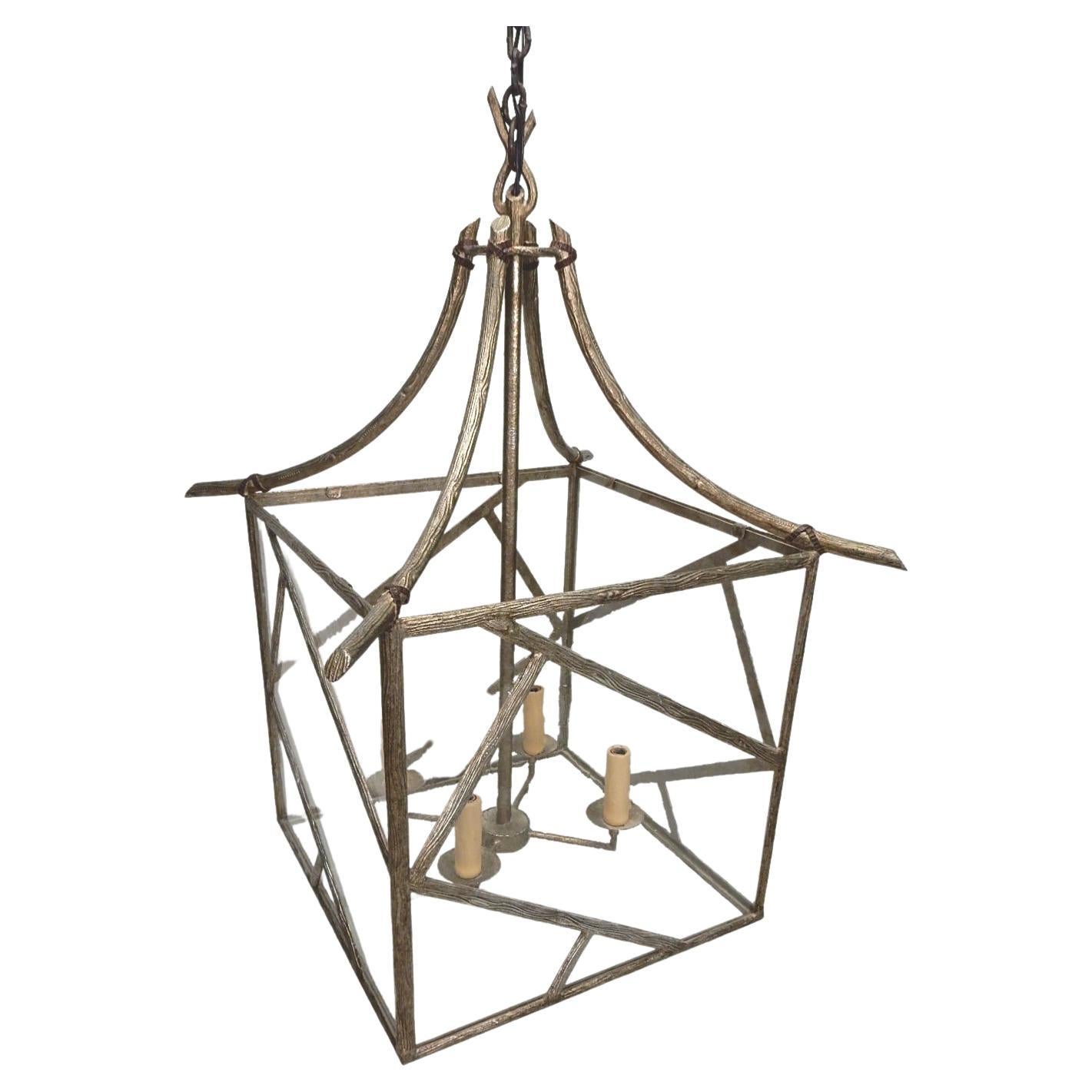 Enormous faux bois twig pagoda chandelier made of brass with platinum finish, circa 1970s.
Massive piece measuring over 2 feet wide and 3 feet tall and a 9 foot drop from ceiling via
a hand forged 6 foot chain with a matching 8 inch wide matching