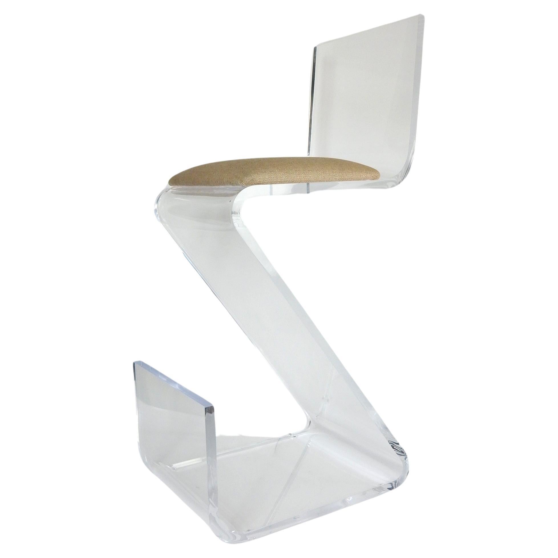 Sculpted 1 inch thick Lucite Z bar stool by Shlomi Haziza for H Studio(signed).
Each hand engraved-signed by Shlomi himself. Labeled on bottom of cushion.
8 available, priced per item.
Counter height. Padded seating area.
An EXTREMELY comfortable